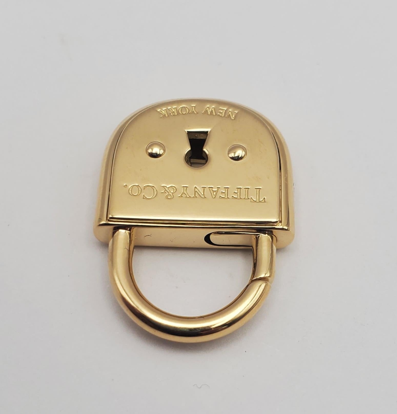 Contemporary Rare Tiffany & Co Solid 18k 750 Yellow Gold Lock Heavy Arc Pendant