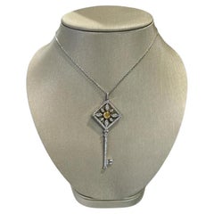 RARE Tiffany & Co. Tiffany Kaleidoscope Pendentif clé en platine avec diamant jaune