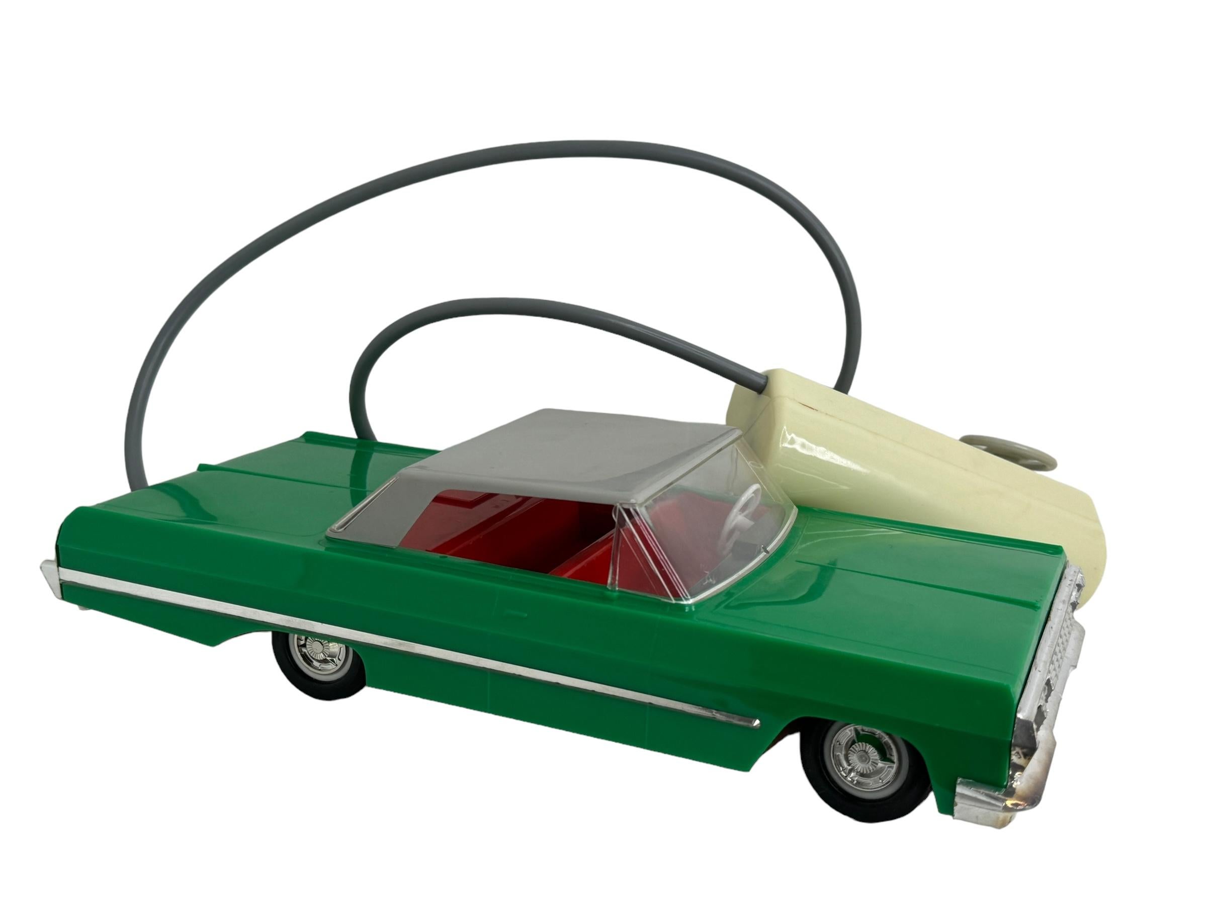 Gorgeous vintage sheet metal and plastic Toy car. Operated by a battery operated remote control engine. In very good condition, with Aging in a few spots but is still a great collectible.
A beautiful decorative item for display. Made in the former
