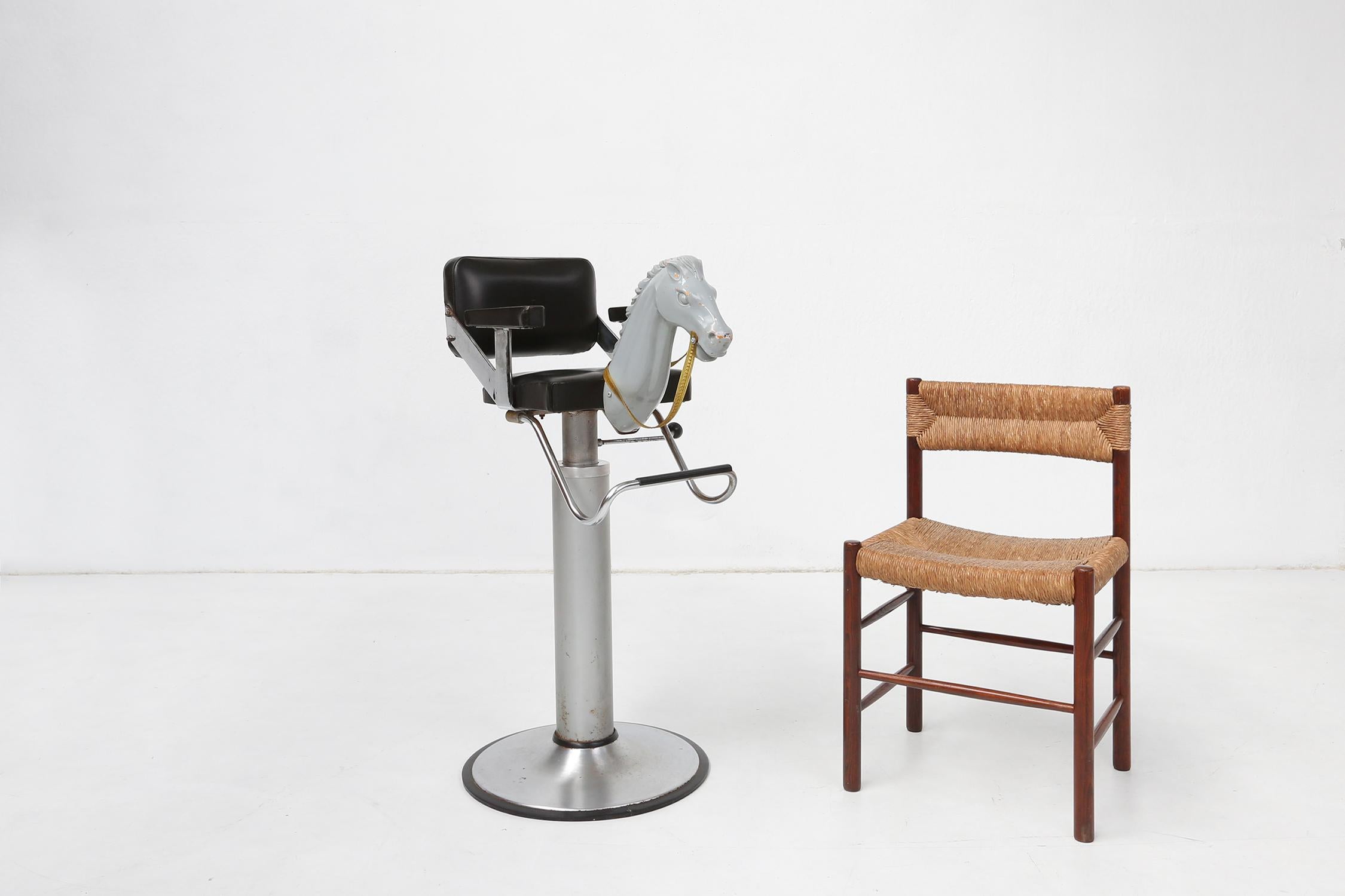 Belgium / 1950 / children’s barber chair with horse  / metal and plastic / mid-century / design / vintage

Very rare to find vintage children’s barber chair with horse head, made in Belgium in the 1950s. With a cast iron construction and black
