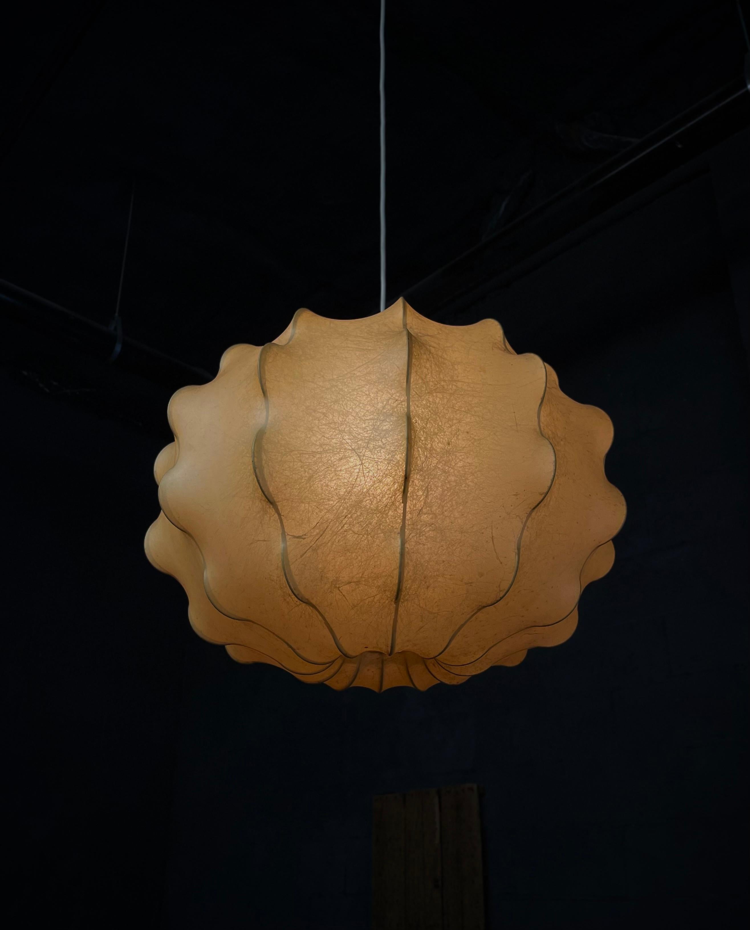 This rare Tobia Scarpa Cocoon Shade Pendant for Flos is original from the 1960s. The pendant has been fully rewired and UL Listed. It is currently wired for plug-in, but can quickly be converted to hard-wired. Great condition, some mild wear