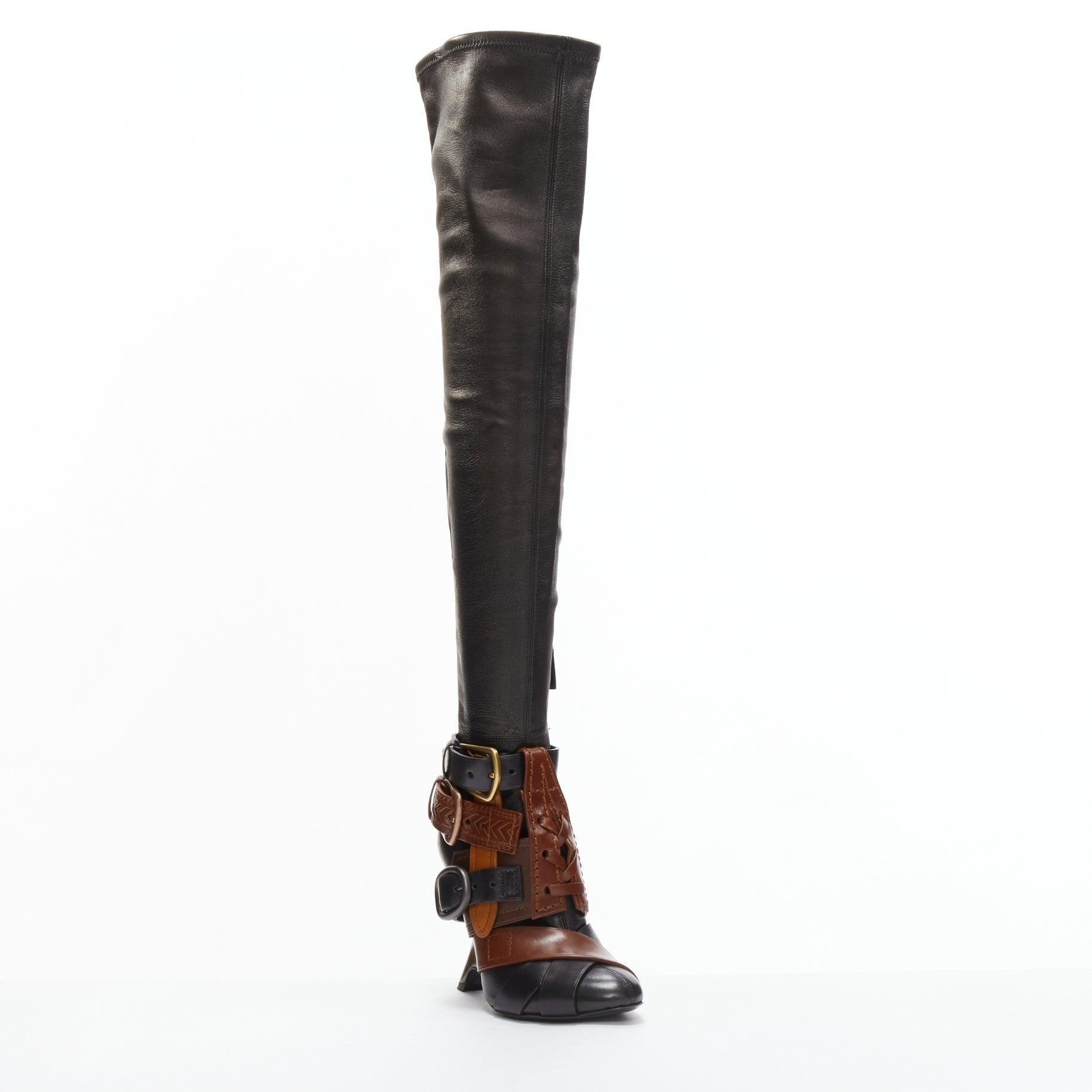 rare TOM FORD Runway brown multi belt buckle thigh high boots EU37.5
Reference: TGAS/D00721
Brand: Tom Ford
Designer: Tom Ford
Collection: 2016 - Runway
Material: Leather, Metal
Color: Black, Brown
Pattern: Solid
Closure: Zip
Lining: Black