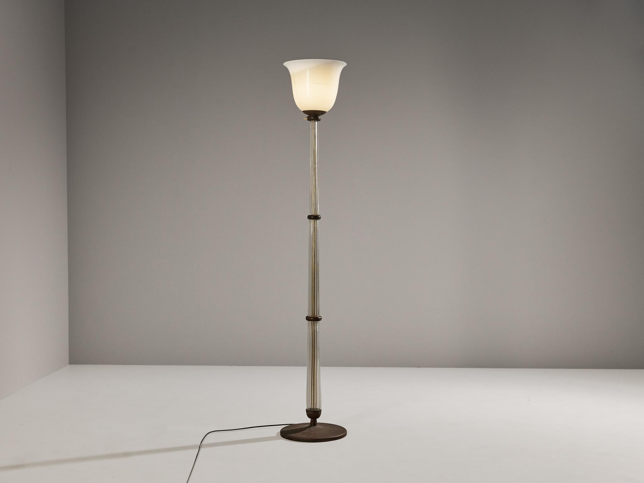 Tomaso Buzzi for Venini, floor lamp, model '502', alga glass, glass, brass, gold leaf, Italy, 1933-1938

A truly magnificent Italian floor lamp designed by the Milanese multidisciplinary artist Tomasso Buzzi (1900-1981) for the esteemed glass