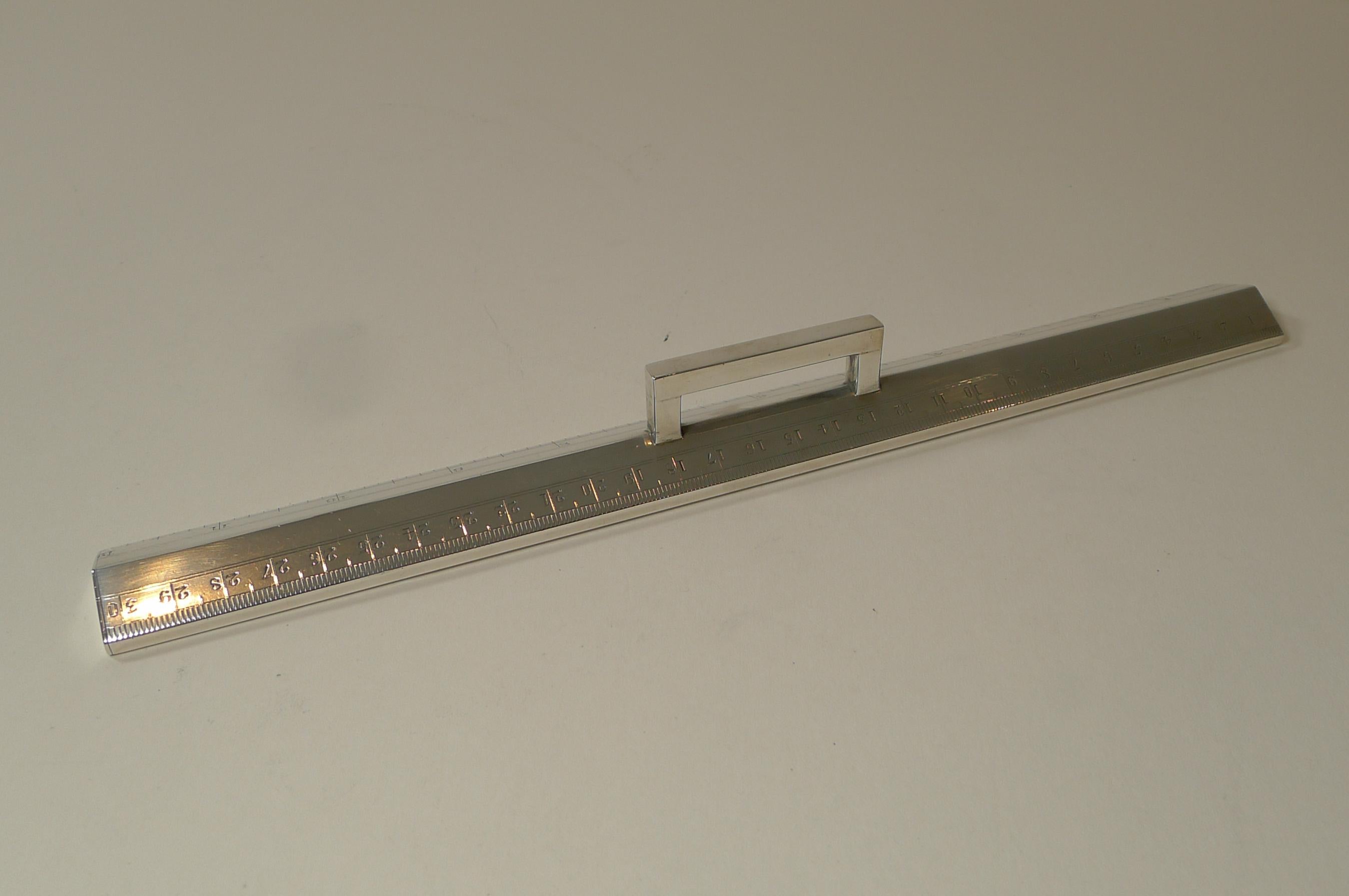 A magnificent and rare hefty desk-top ruler by one of the creme de la creme of silversmith's, John Collard Vickery.

The numbers are crisp, the hallmark and English design registration number are clear and the ruler is without knocks, damage or