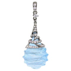 Rare pendentif en or blanc avec topaze et diamant blanc