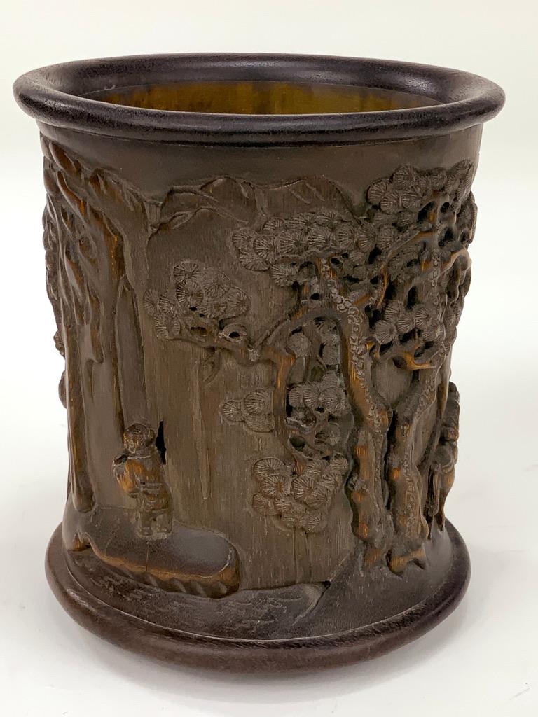 This antique hand carved Chinese bamboo root brush pot is in excellent condition. No cracks in the wood and all carving is in great condition with no chips or missing pieces. 

The wood is smooth and soft to the touch with no rough areas at