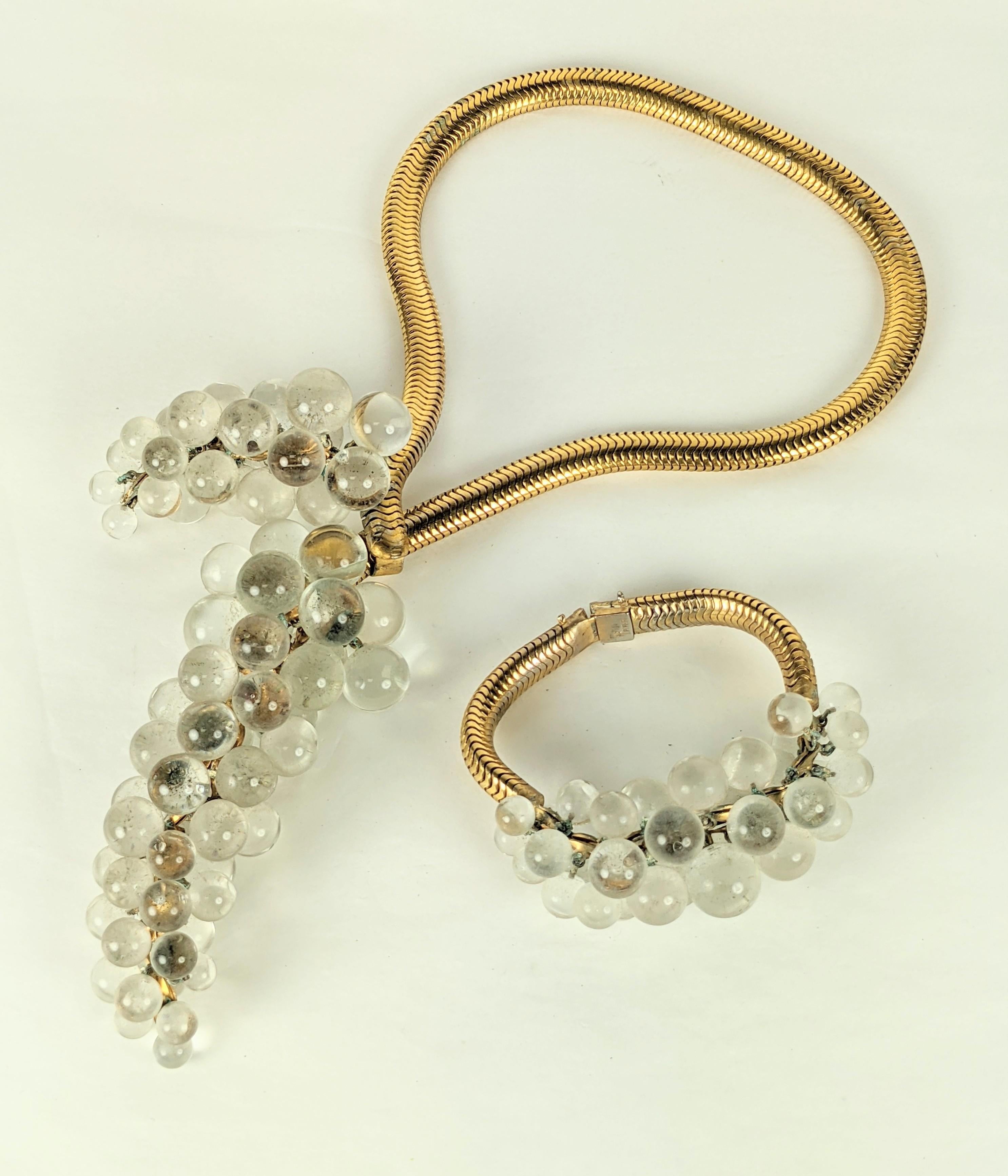 Rare and unusual Trifari Alfred Phillipe Crystal Retro Cluster Necklace and Bracelet from the late 1930's.Suzanne Belperron  inspired. Super rare, and designed with crystal ball grape like clusters on a gilt snake chain. A hook closes the necklace