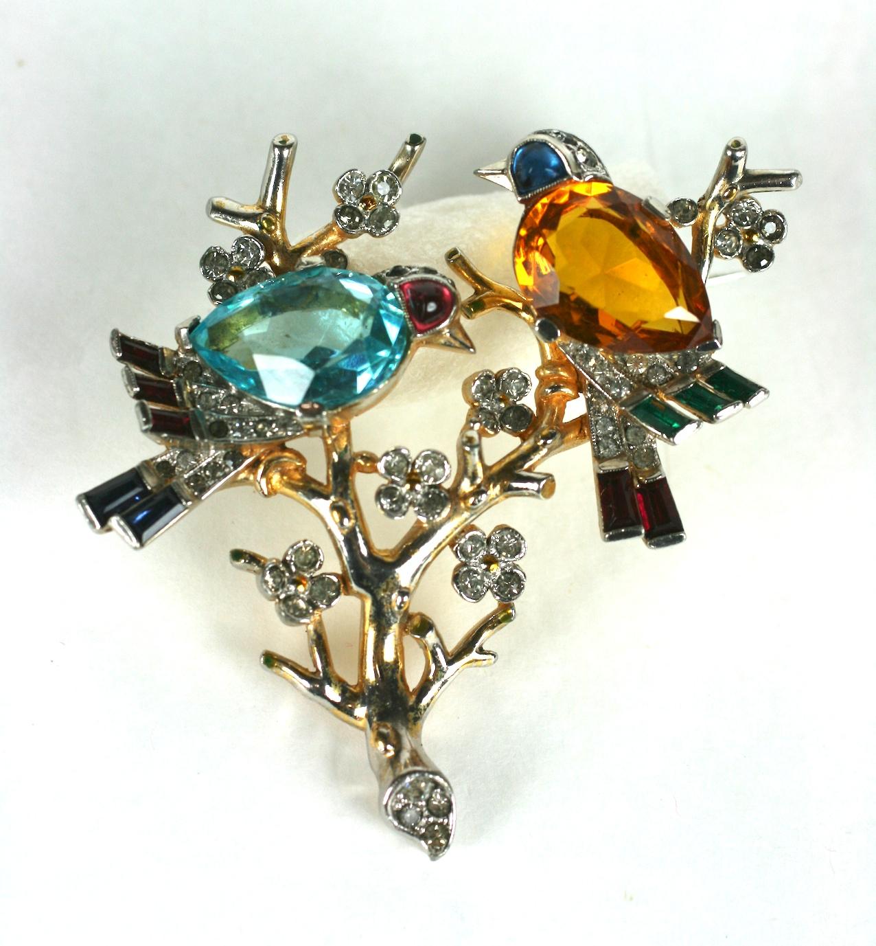Super Rare Trifari Art Deco Birds on Branch by Alfred Phillipe circa 1930's. Beautiful design of 2 Art Deco birds perched on a branch with tiny pave flower buds. Large teardrop aquamarine and citrine pear shaped paste stones form the bodies with