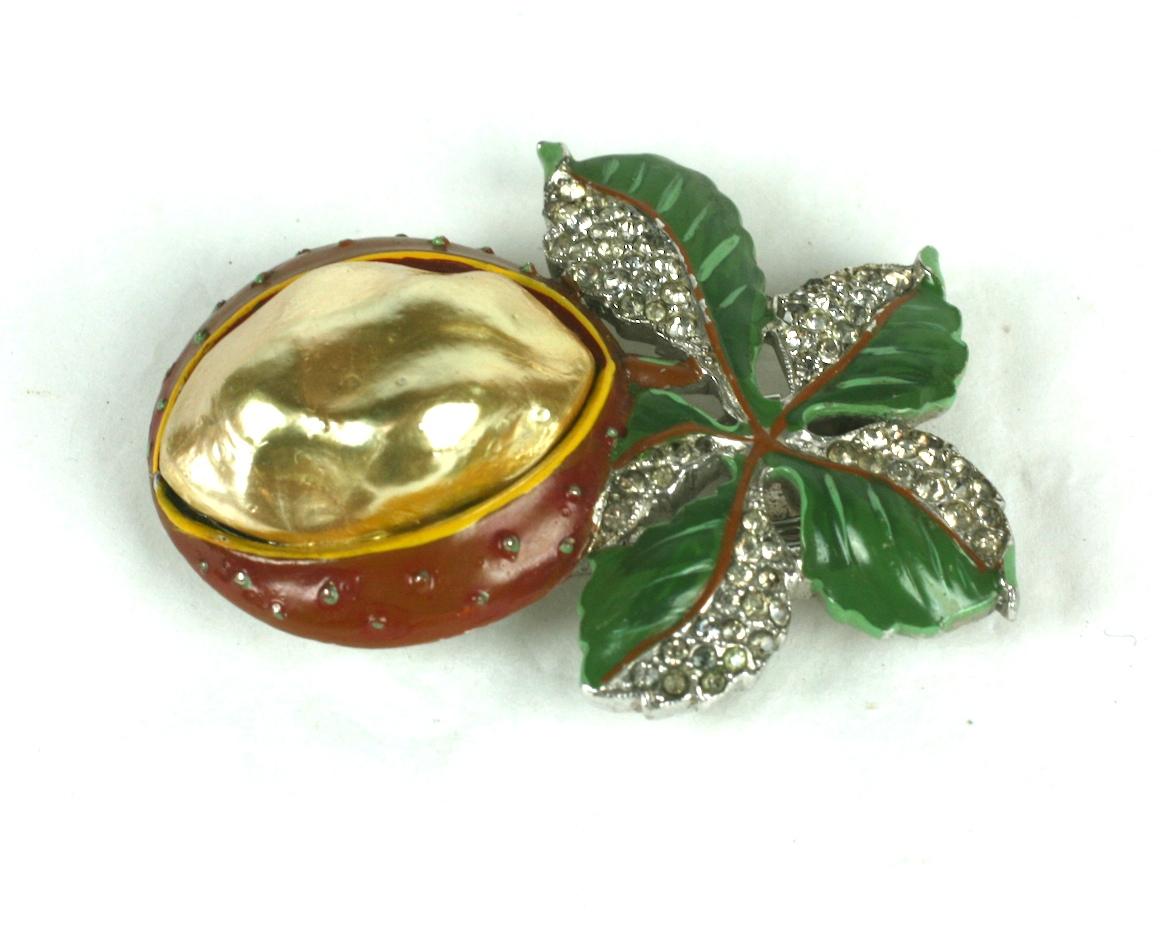 Rare Alfred Philippe for Trifari horse chestnut clip brooch. Of crystal rhinestone pave,  hand painted enamel with pearl nacre baroque belly set in rhodium plated base metal, 1940's USA. 
Excellent Condition. 
Signed Trifari with Crown, Pat Pend.
L 
