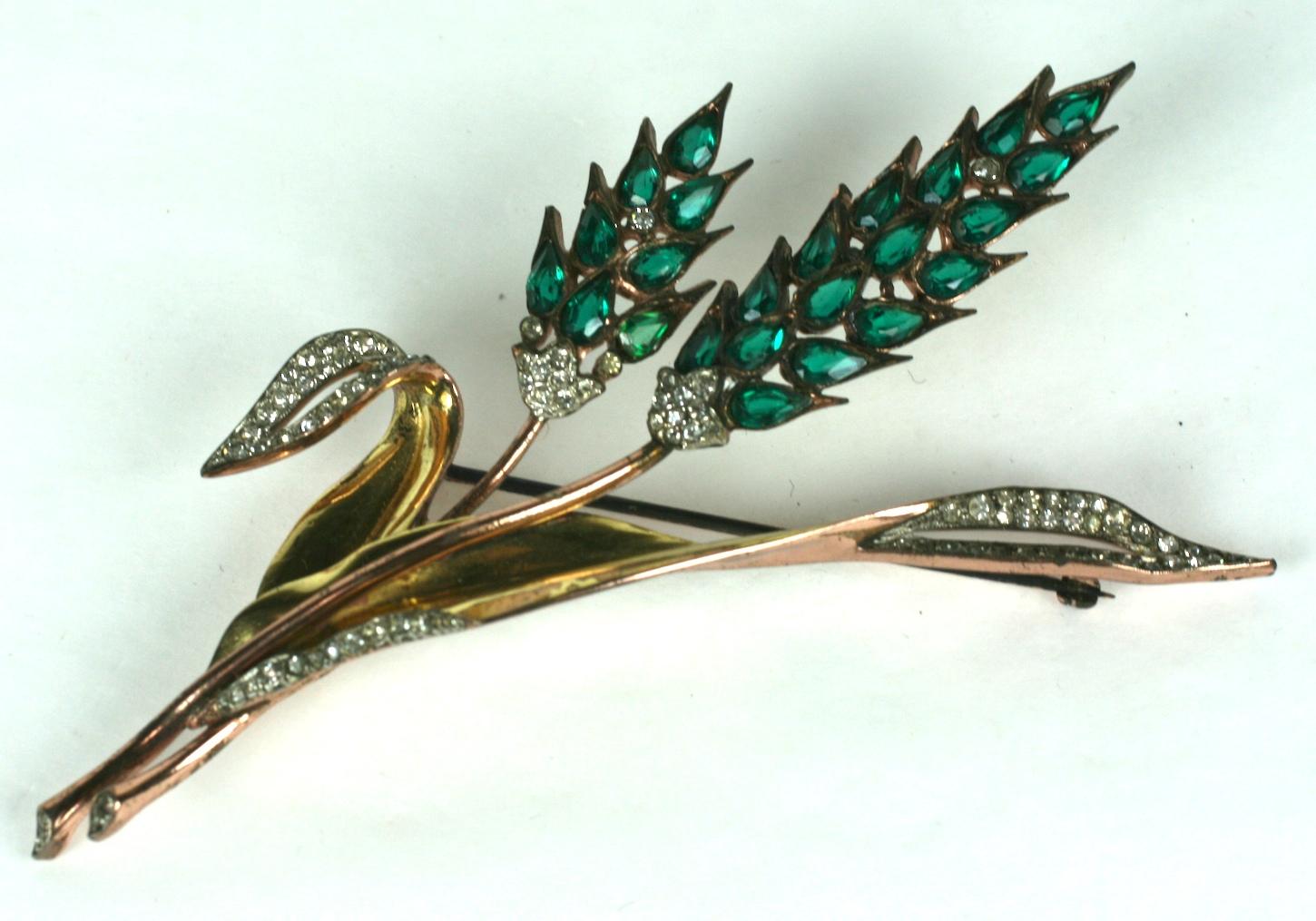 Rare Trifari Retro Wheat Brooch on 2 toned gold washed sterling from the 1940's. Pink gold plate over sterling is used for the stems and base with a yellow gold finish for the rest of the brooch. 
Beautifully designed by Alfred Phillipe for Trifari