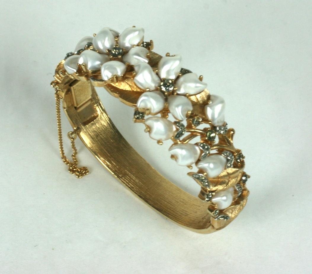 Rare Trifari Tooth Pearl Bangle with hinged closure. Desirable and collectible series by Trifari using faux 