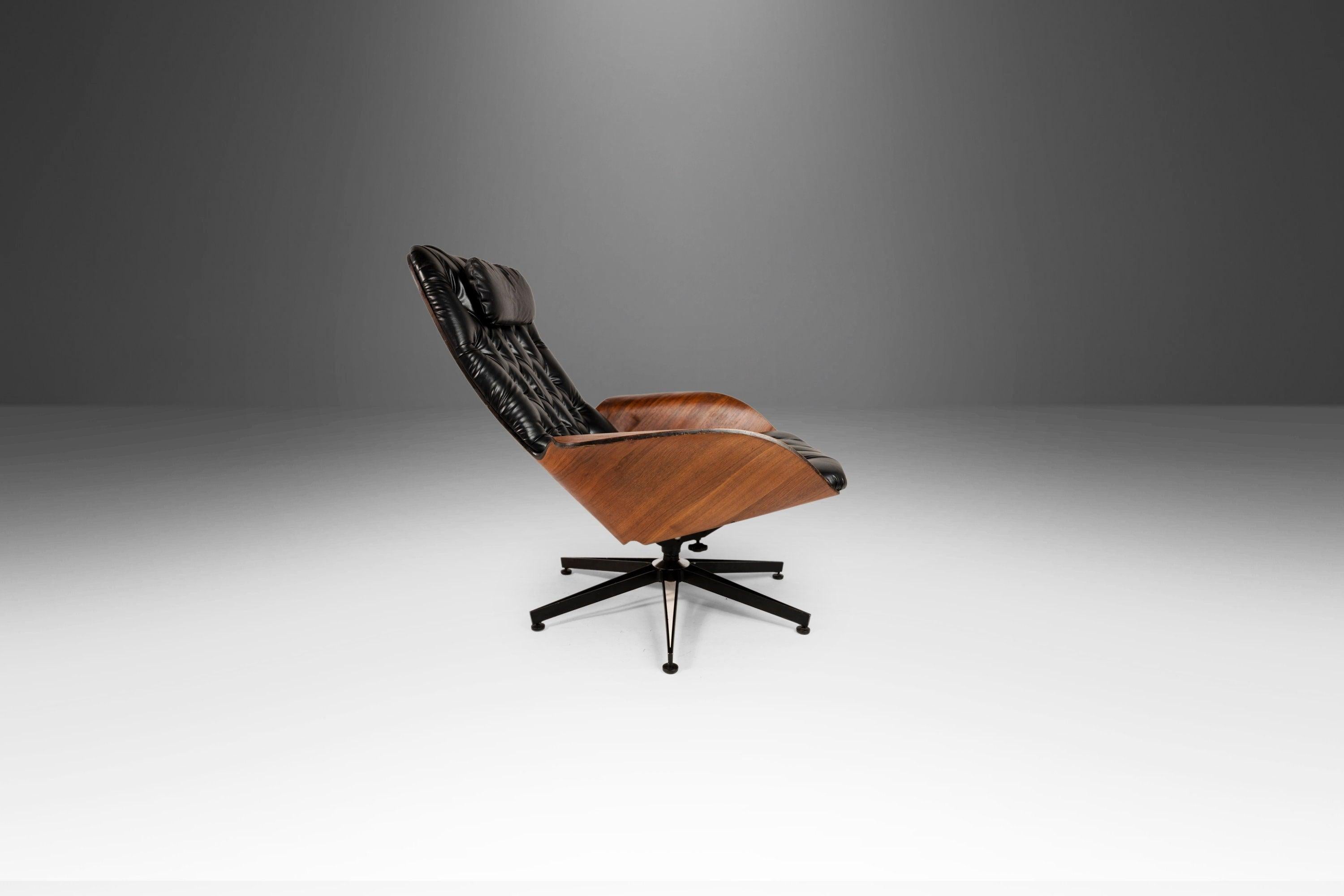 Equal parts comfort and style this iconic Mr. Chair, designed by the acclaimed George Mulhauser, is the epitome of functional art. The shell, constructed of audaciously-shaped bent walnut plywood, has become iconic and timeless. Able to recline to a