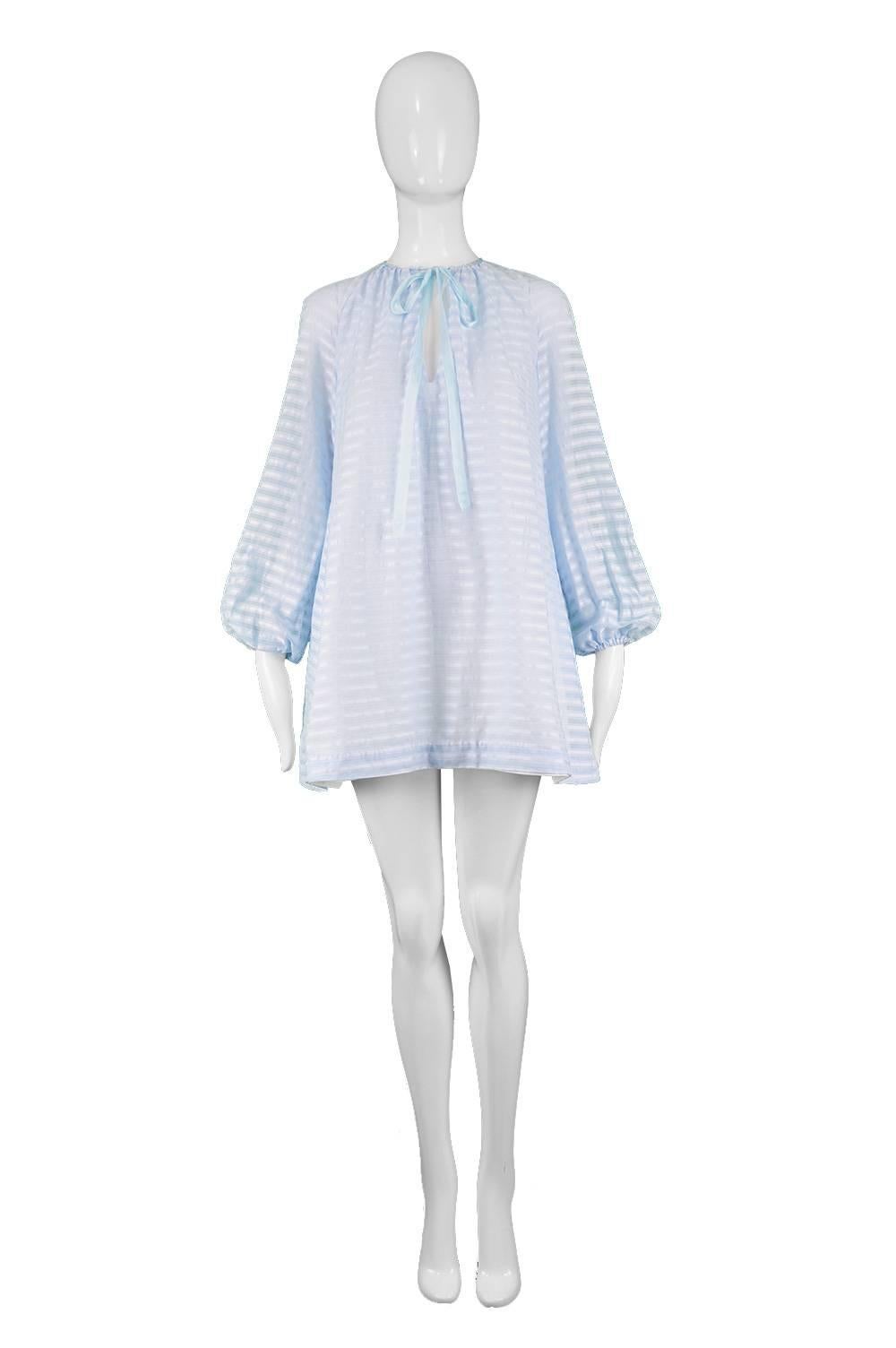 Rare Twiggy Label Sky Blue Cotton Striped Vintage Mini Mod Shift Dress, 1960s

Estimated Size: UK 8/ US 4/ EU 36. Please check measurements. 
Bust - 32” / 81cm
Waist - 36” / 91cm
Hips - 42” / 106cm
Length (Shoulder to Hem) - 30” / 76cm
Sleeve Pit to