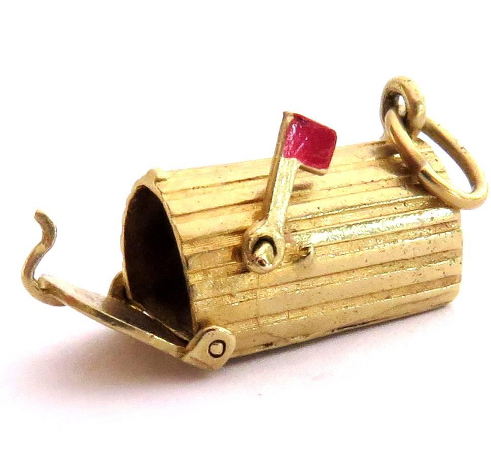 This wonderful 14k charm is so unique. It will be a cherished addition to any charm bracelet. It has 2 movable parts, the flag and the door to the mailbox.  You can even write a little note to put inside the mailbox to make it even more