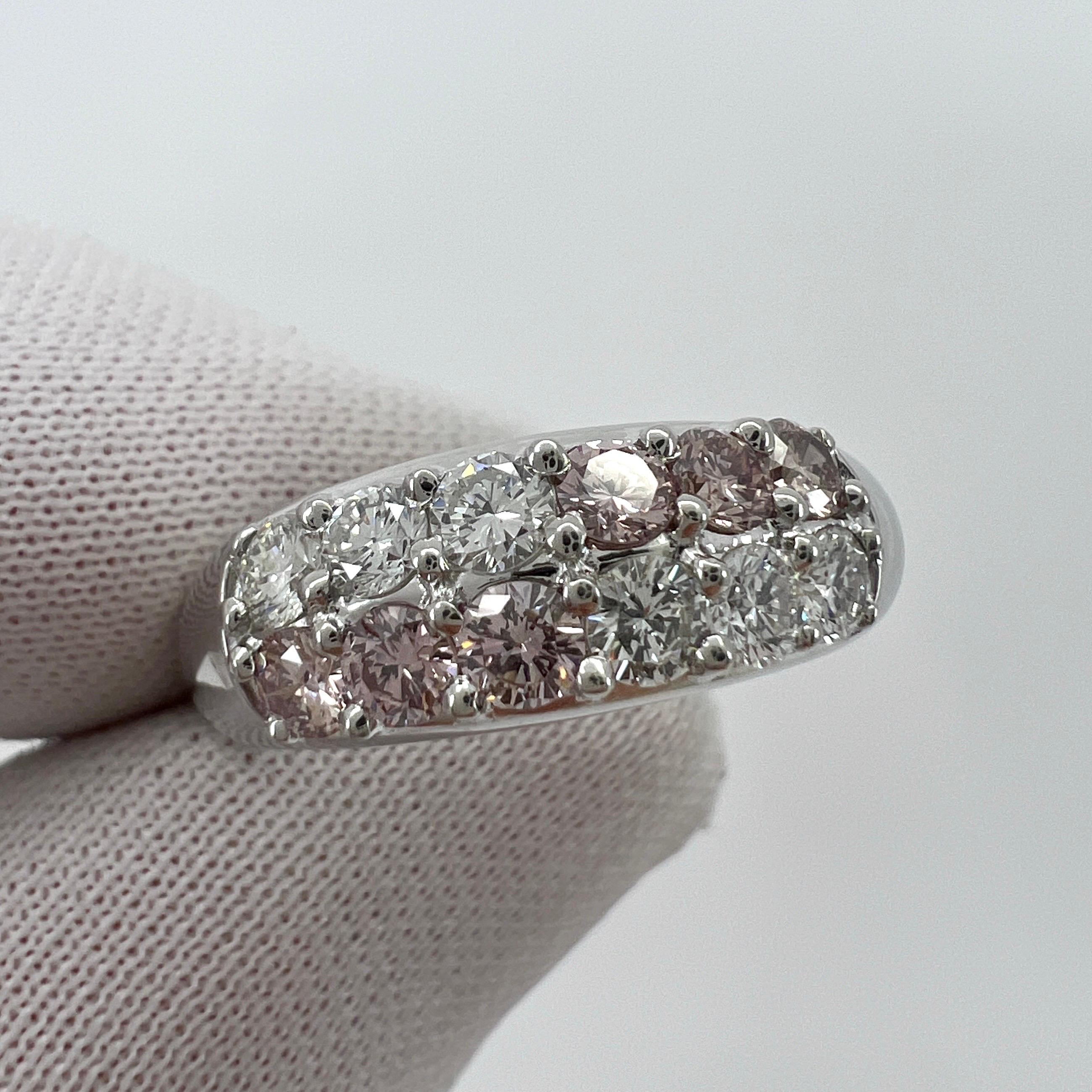 Natural Fancy Pink & White Diamond Round Cut 2 Row 1/4 Eternity Platinum Ring.

A beautiful platinum ring set with 6 round brilliant cut natural fancy pink diamonds (0.45ct) and 6 round brilliant cut natural white diamonds (0.46ct E/G colour). 
All