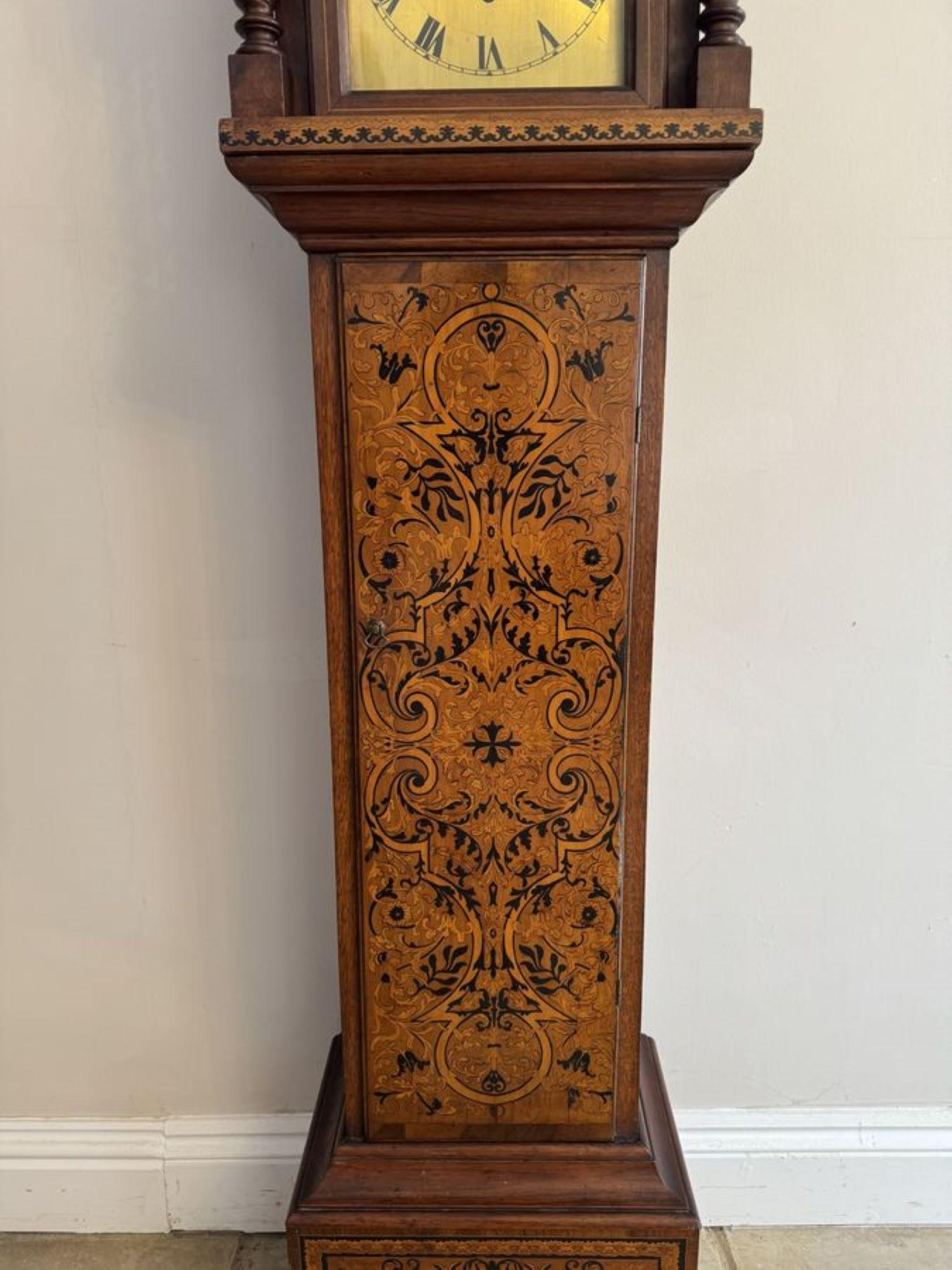 Rare unusual antique Edwardian musical quality inlaid marquetry grandmother clock having an outstanding quality inlaid marquetry case with a shaped inlaid marquetry hood and barley twist columns, the long door having inlaid marquetry scrolls,