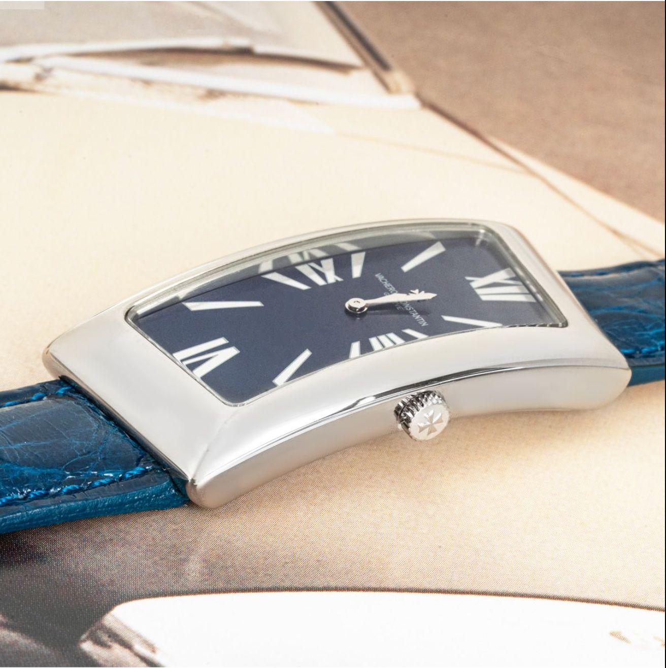 A rare white gold Asymmetric wristwatch by Vacheron Constantin. Featuring a distinctive blue dial with roman numerals and a white gold bezel. Fitted with a sapphire glass, a quartz movement and a generic leather strap set with an original white gold