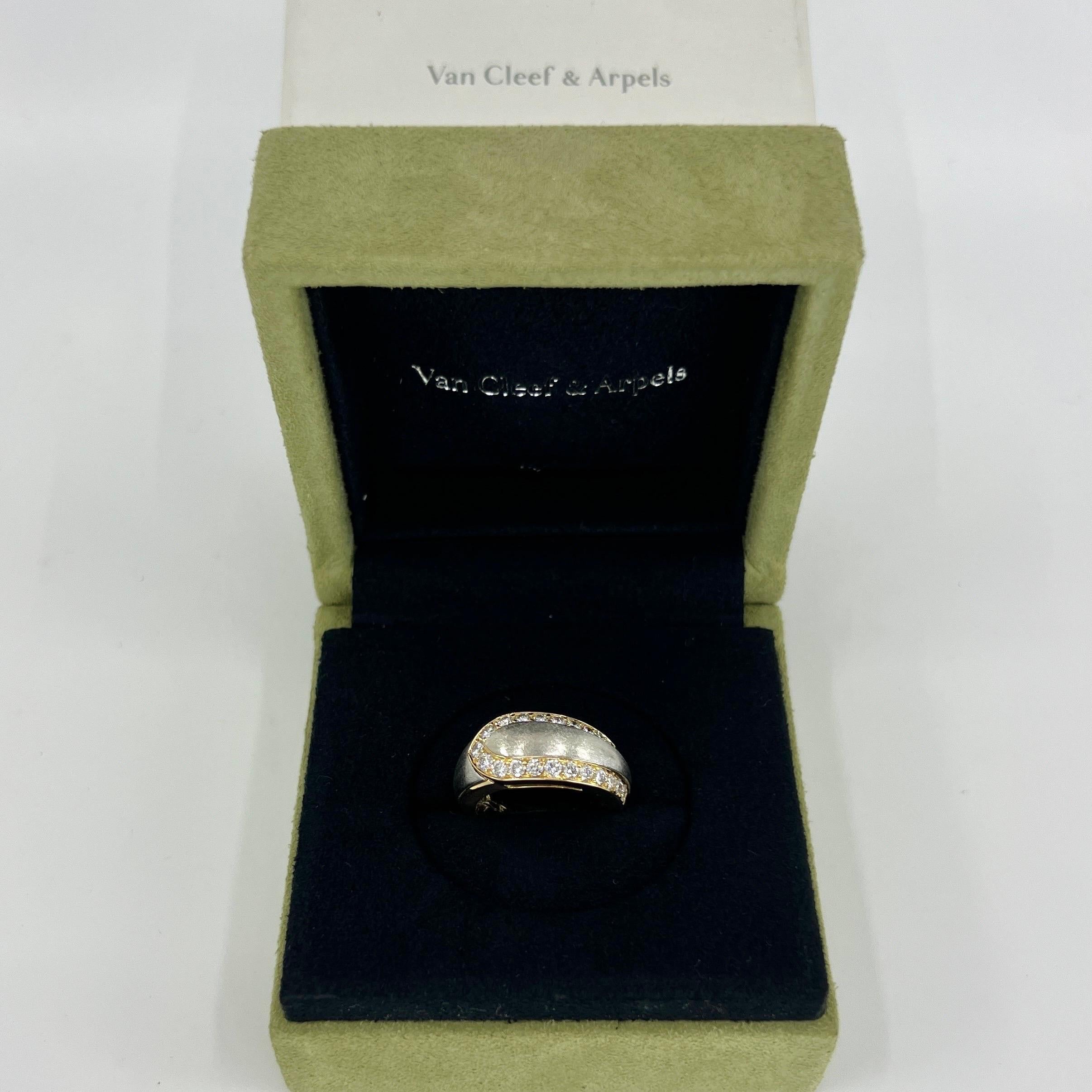 Rare Vintage Van Cleef & Arpels Diamond 18k Yellow And White Gold Cocktail Ring.

A stunning vintage ring with a unique bold design typical of Van Cleef & Arpels.

This ring features a central raised white gold piece with a textured brushed effect,