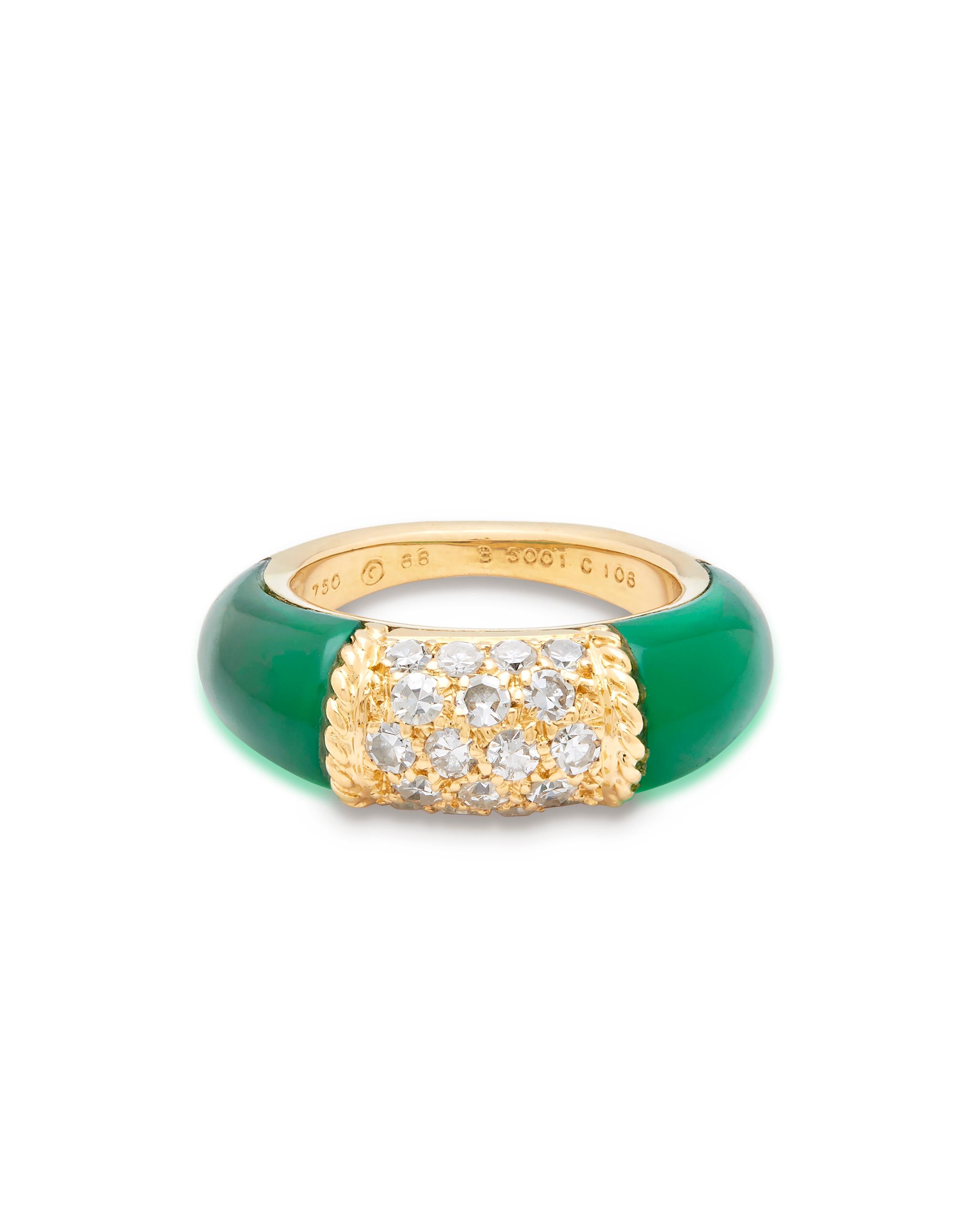 18ct gold Very Rare Van Cleef & Arpels PHILIPPINES ring 

Set with 2 polished green Chrysoprase hard stones either side of a Diamond Pave centre. 

Van Cleef & Arpeks arguably the Master of all French Maisons presents this absolute classic style,