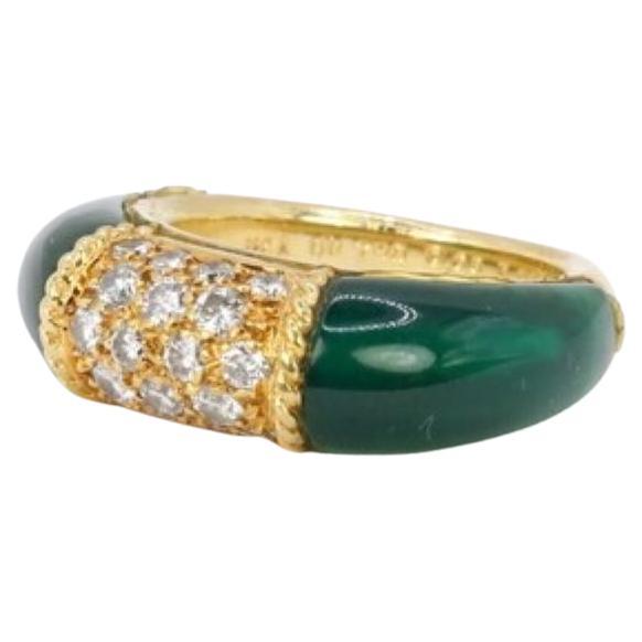 18ct gold Very Rare Van Cleef & Arpels PHILIPPINES ring 

Set with 2 polished green Chrysoprase hard stones either side of a Diamond Pave centre. 

Van Cleef & Arpeks arguably the Master of all French Maisons presents this absolute classic style,