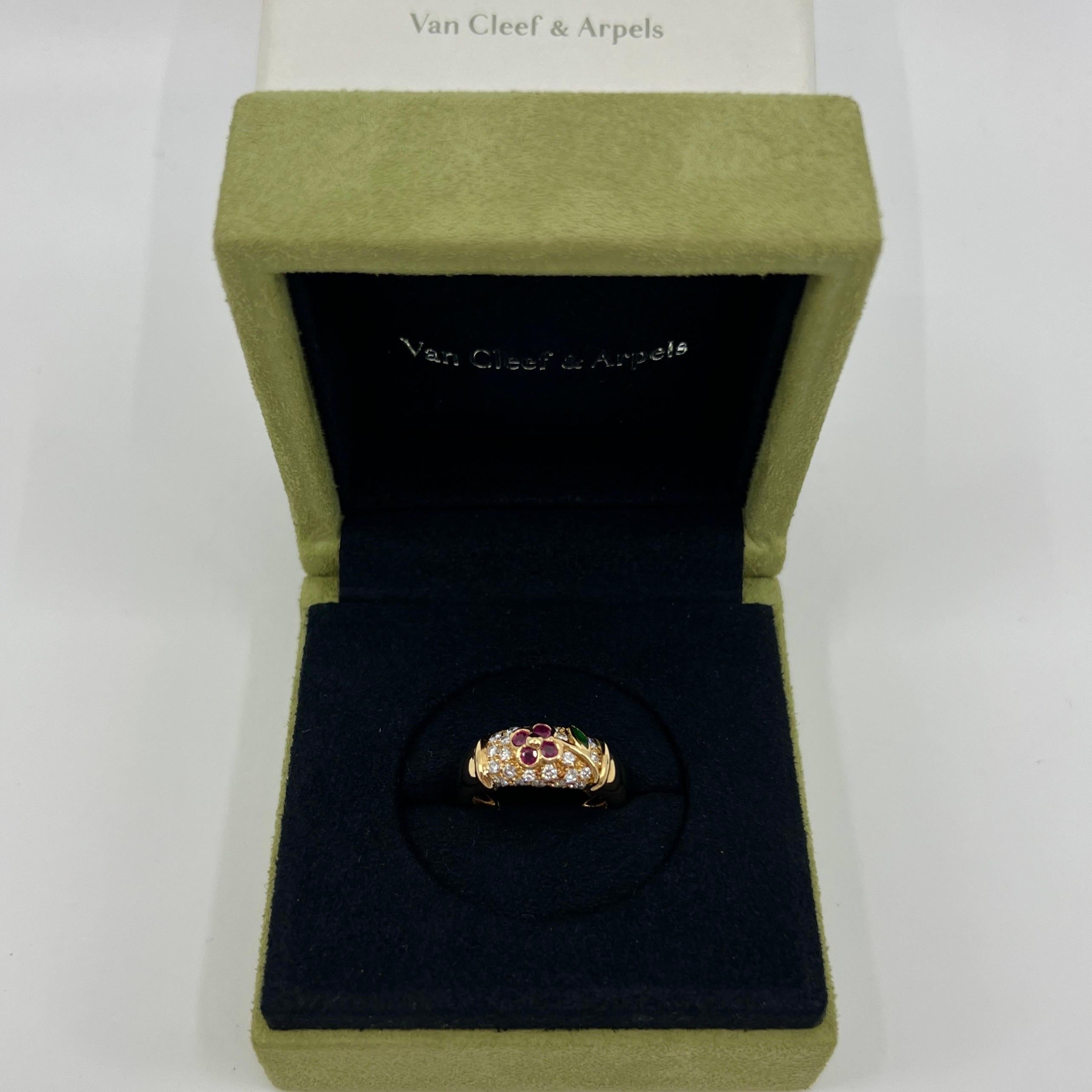 Rare Vintage Van Cleef & Arpels Fine Ruby, Emerald And Diamond 18k Yellow Gold Floral Flower Ring.

A stunning vintage ring with a unique floral design typical of Van Cleef & Arpels, set with a beautiful marquise cut fine green emerald measuring