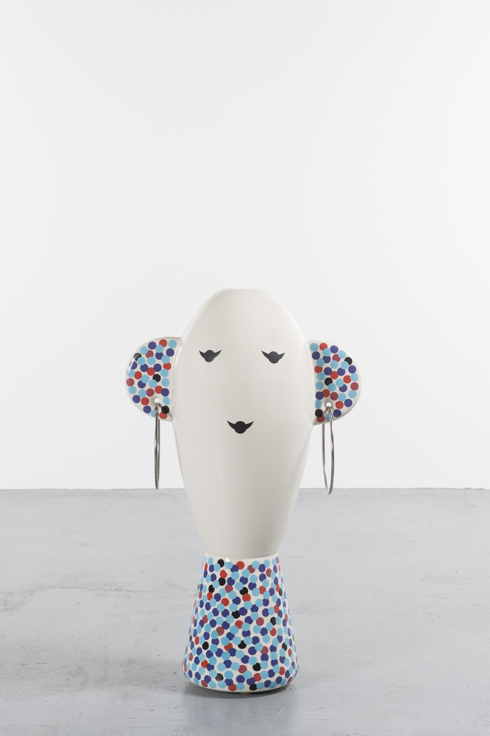 Vaso Viso TOTEM by Alessandro Mendini and Produced by Alessi, 2001, Italy

Polychrome enameled ceramic sculpture designed in 2001 by Alessandro Mendini and edited by Alessi, iconic Italian brand, in a limited edition of 99 pieces. This item is