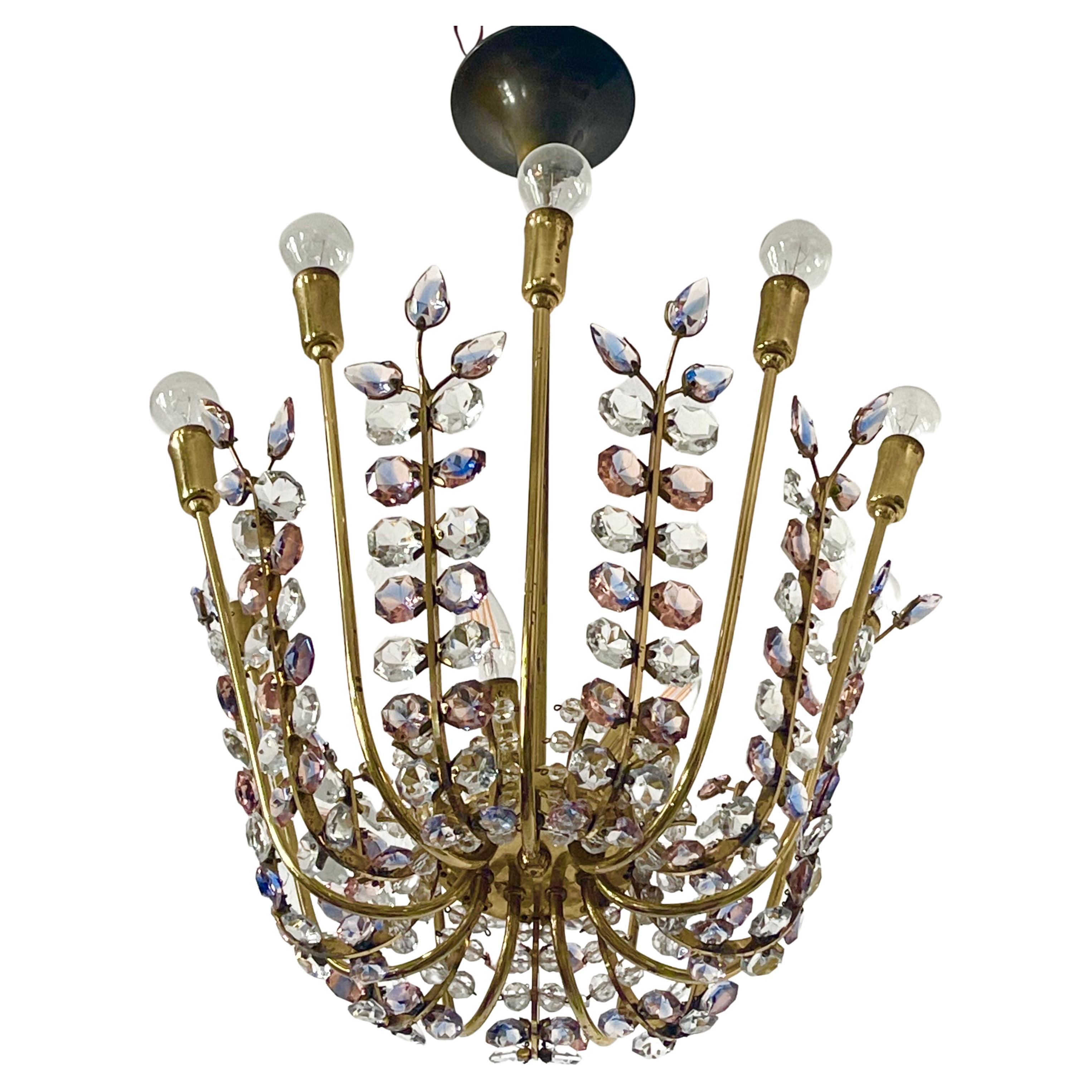Rare midcentury cut glass and gilt brass nine -arms and chandelier designed by Oswald Haerdtl for Bakalowits & Sohne, Austria, Vienna, circa 1950s.
Socket: 12 x e14 for standard screw bulbs.
In a very good original condition.


