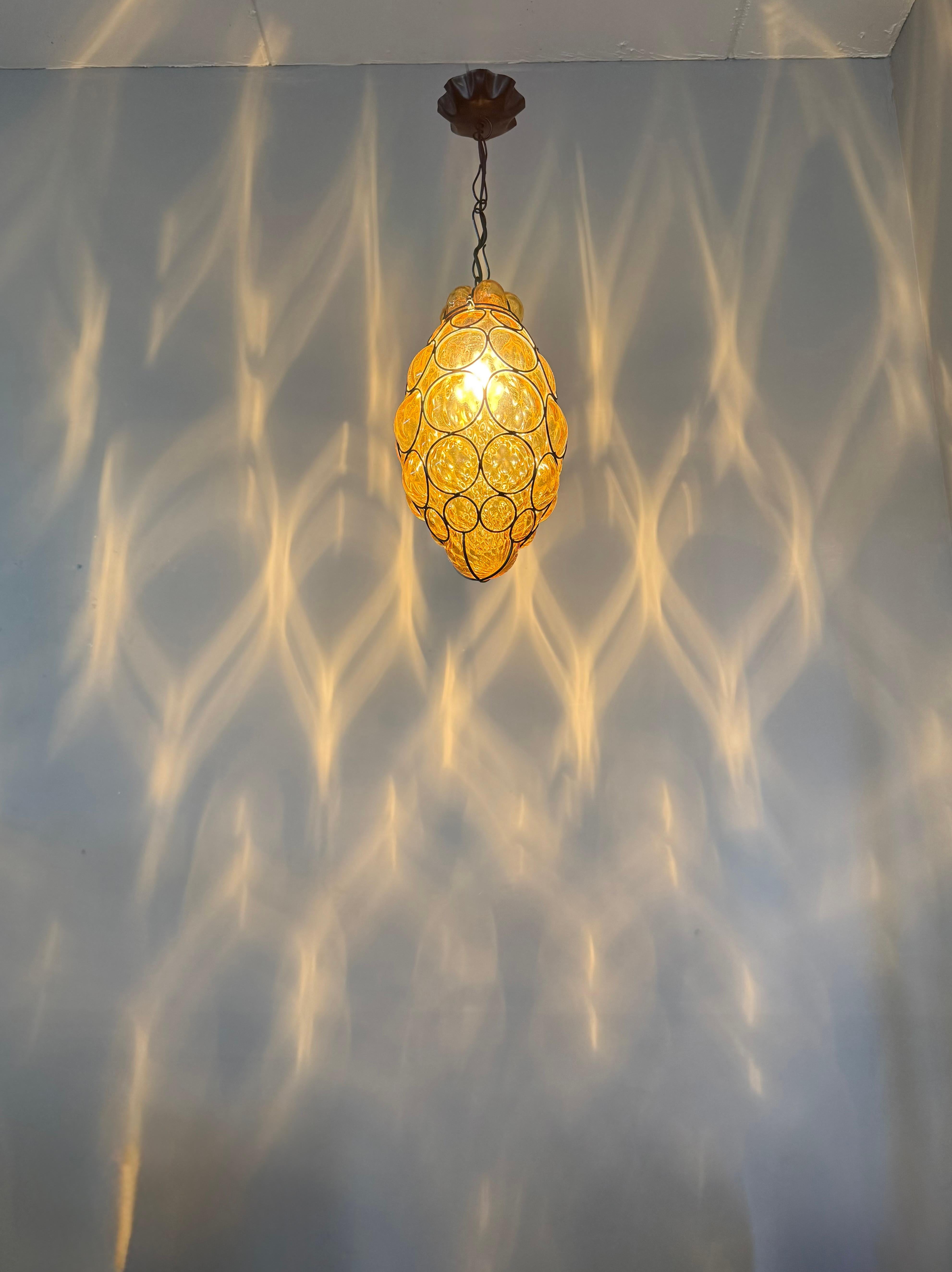 Rare Venetian Murano Pendant Light with Mouth Blown Amber Colored Glass in Frame For Sale 12