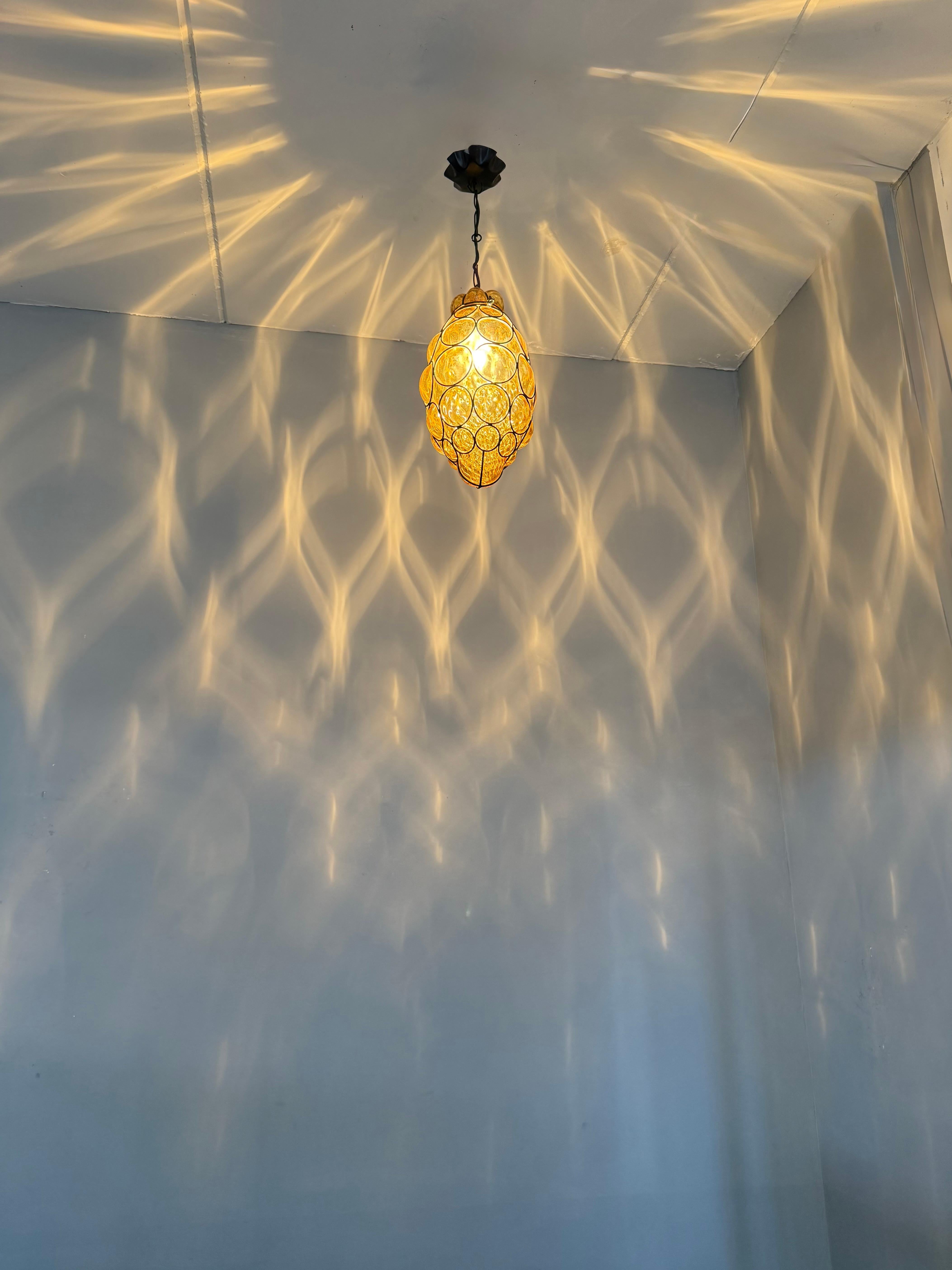 Italian Rare Venetian Murano Pendant Light with Mouth Blown Amber Colored Glass in Frame For Sale