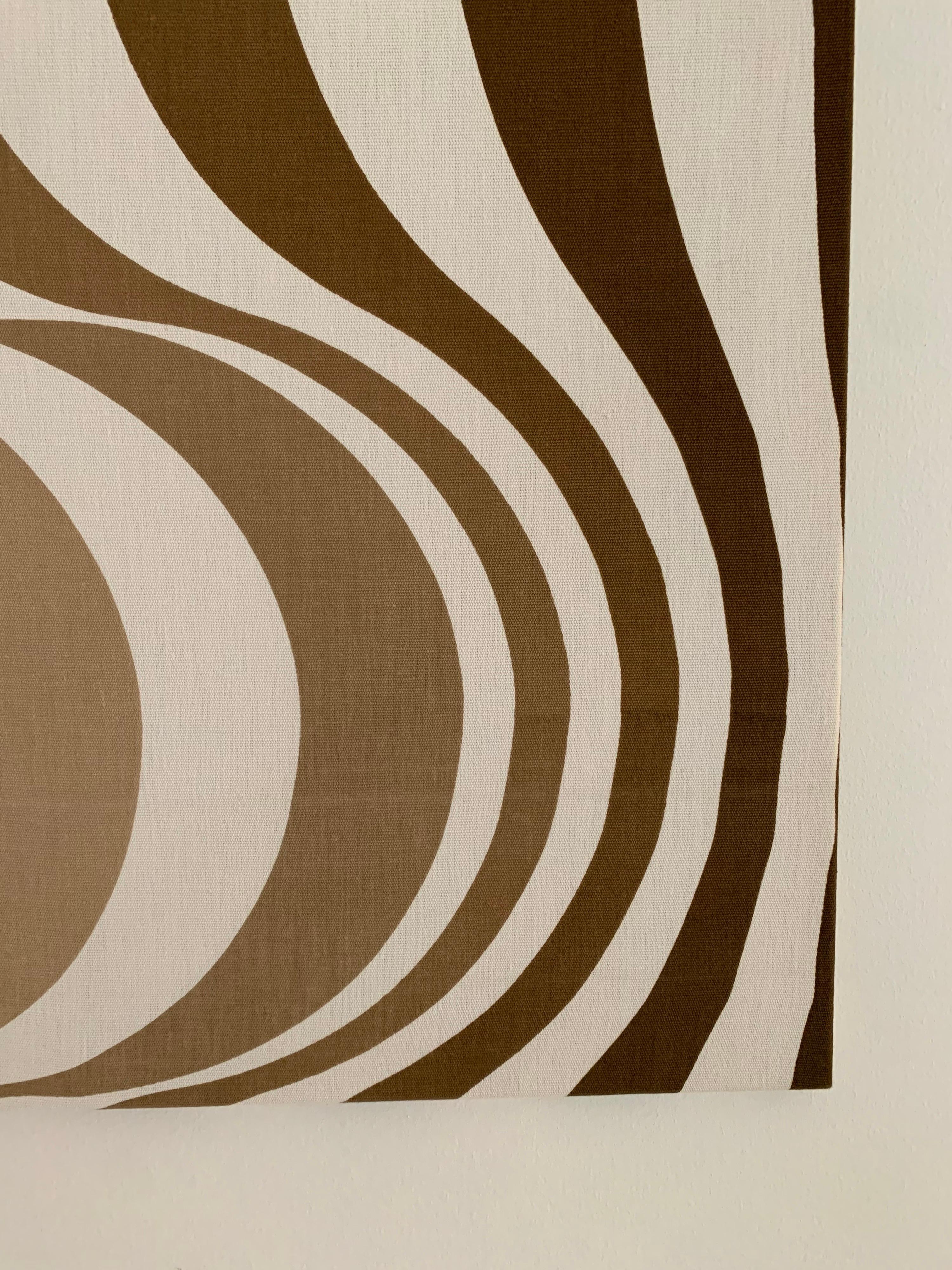 A stunning Verner Panton stretched textile titled the “Onion” was created in the 1970’s. It uses waveforms in a way that creates rhythm and immersive experience for the viewer. One of a dozen mid-century stretched textiles we will feature this week