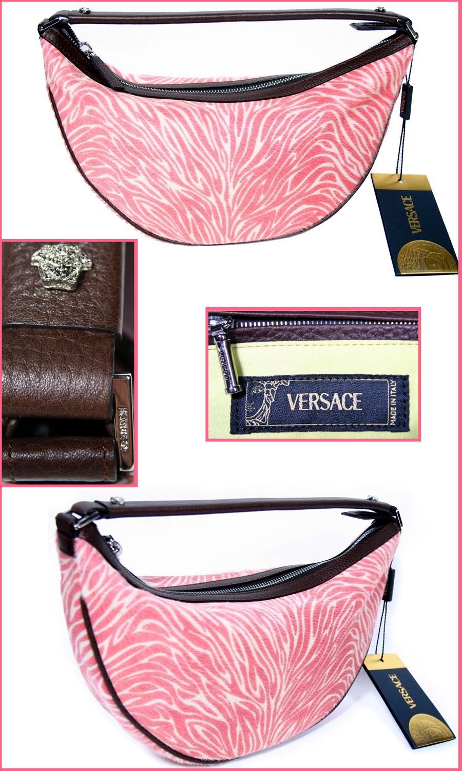 BRAND NEW VERSACE BAG

With its luxurious textures and chic silhouette, this gorgeous bag exudes contemporary glamour. In zebra-printed calf hair, finished with brown leather and silver metal hardware.

Zebra-printed calf hair with brown leather
