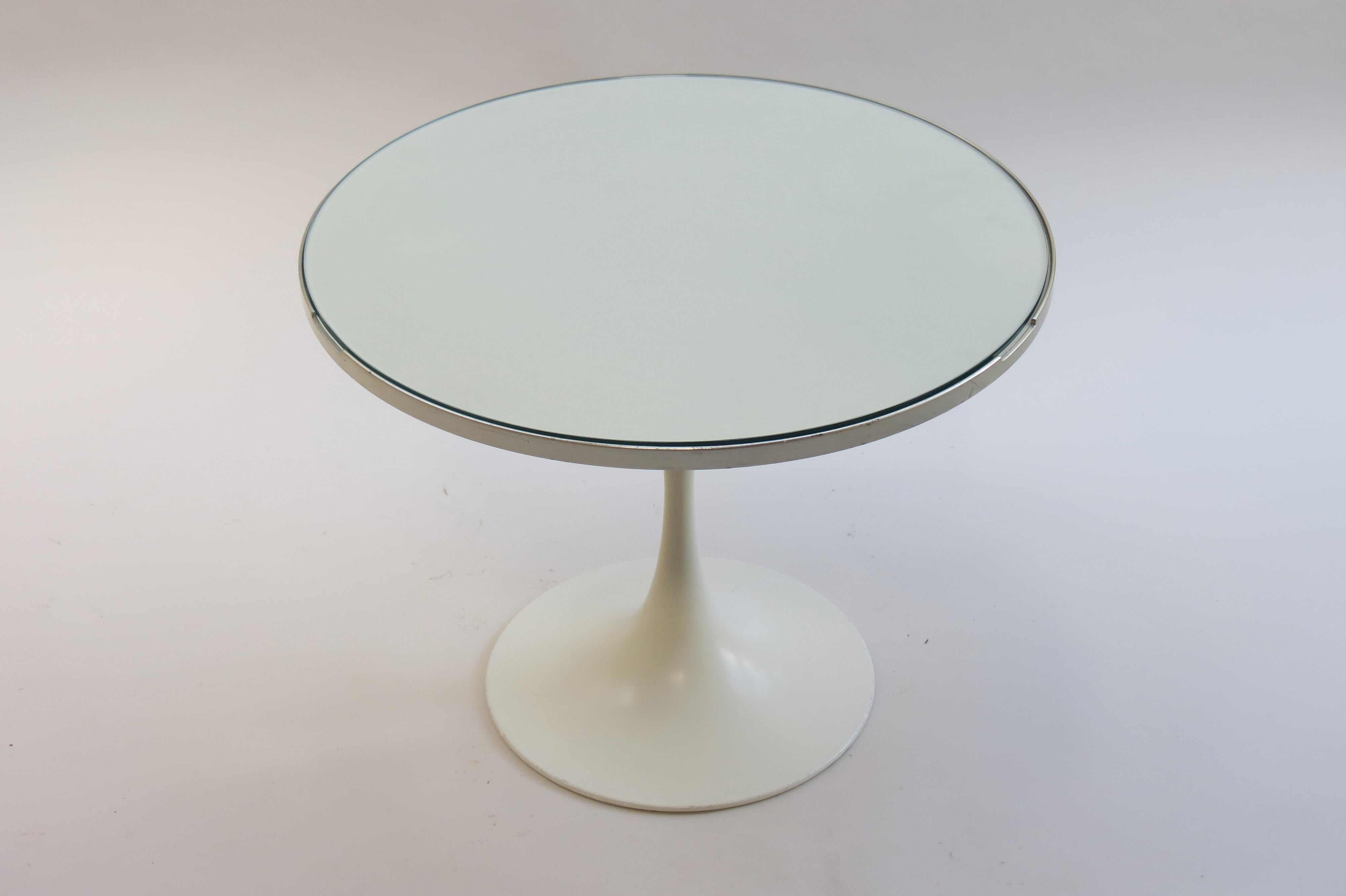 1960s white tulip side table by Maurice Burke for Arkana, UK

White tulip table, manufactured by Arkana, Bath UK and designed by Maurice Burke in the 1960s.

This is a very rare version of an Arkana low side table. White Formica top with