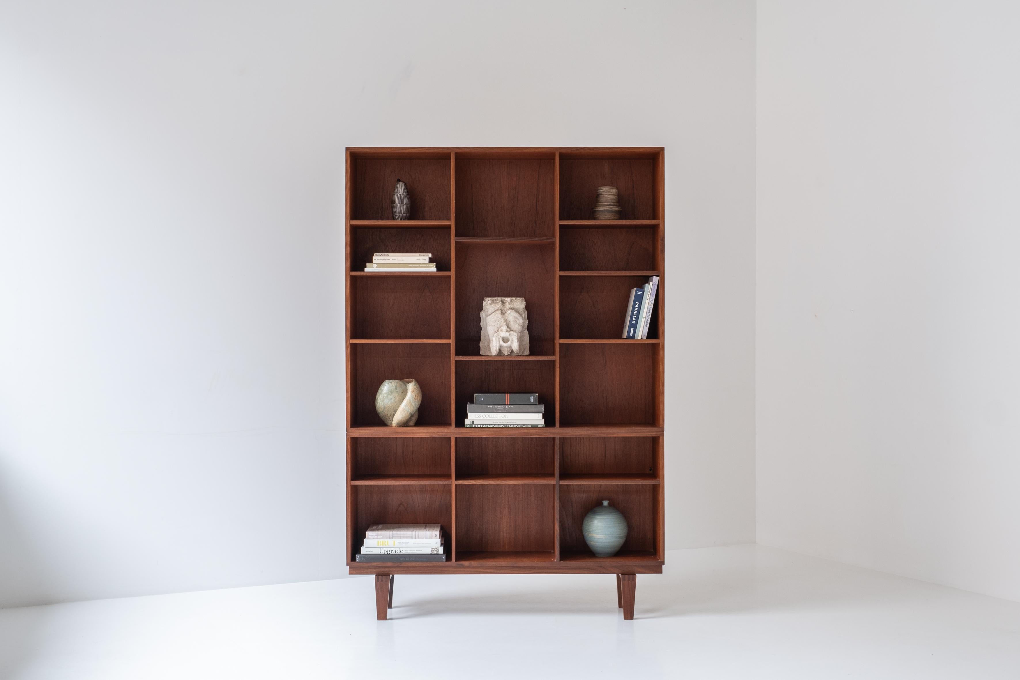 Rare version of this bookcase by Peter Løvig Nielsen for Løvig, Denmark, 1960s. This cabinet is made out of teak and the shelves are adjustable in height. This unit consists of two individually pieces placed on each other. Presented in its original