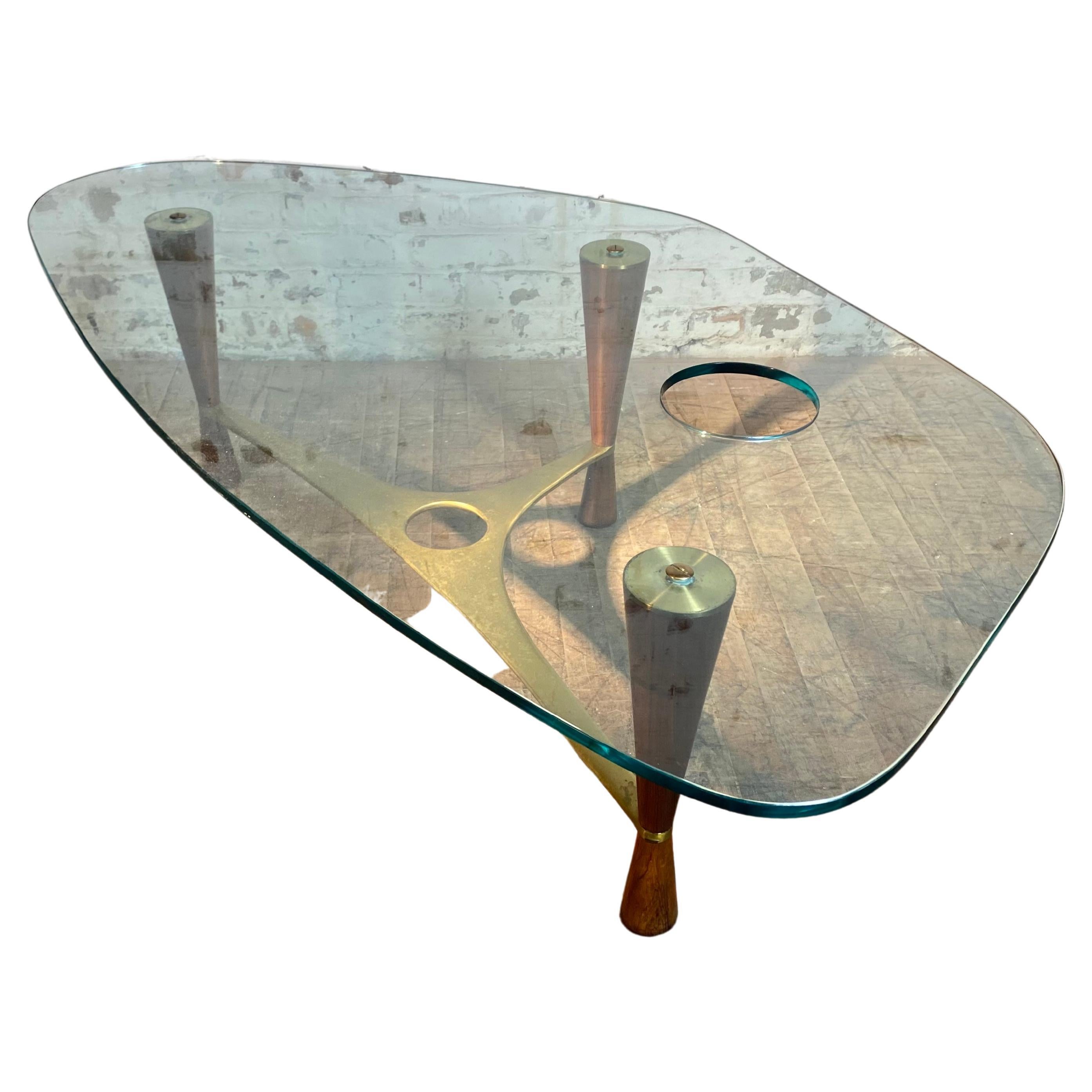 Model 5309 rare coffee table by Edward Wormley for Dunbar. Combination of rosewood and brass with the original glass top.,,Extremely rare version with polished HOLE cut into top,,with original glass bowl,,Stunning ,,classic example of modernist