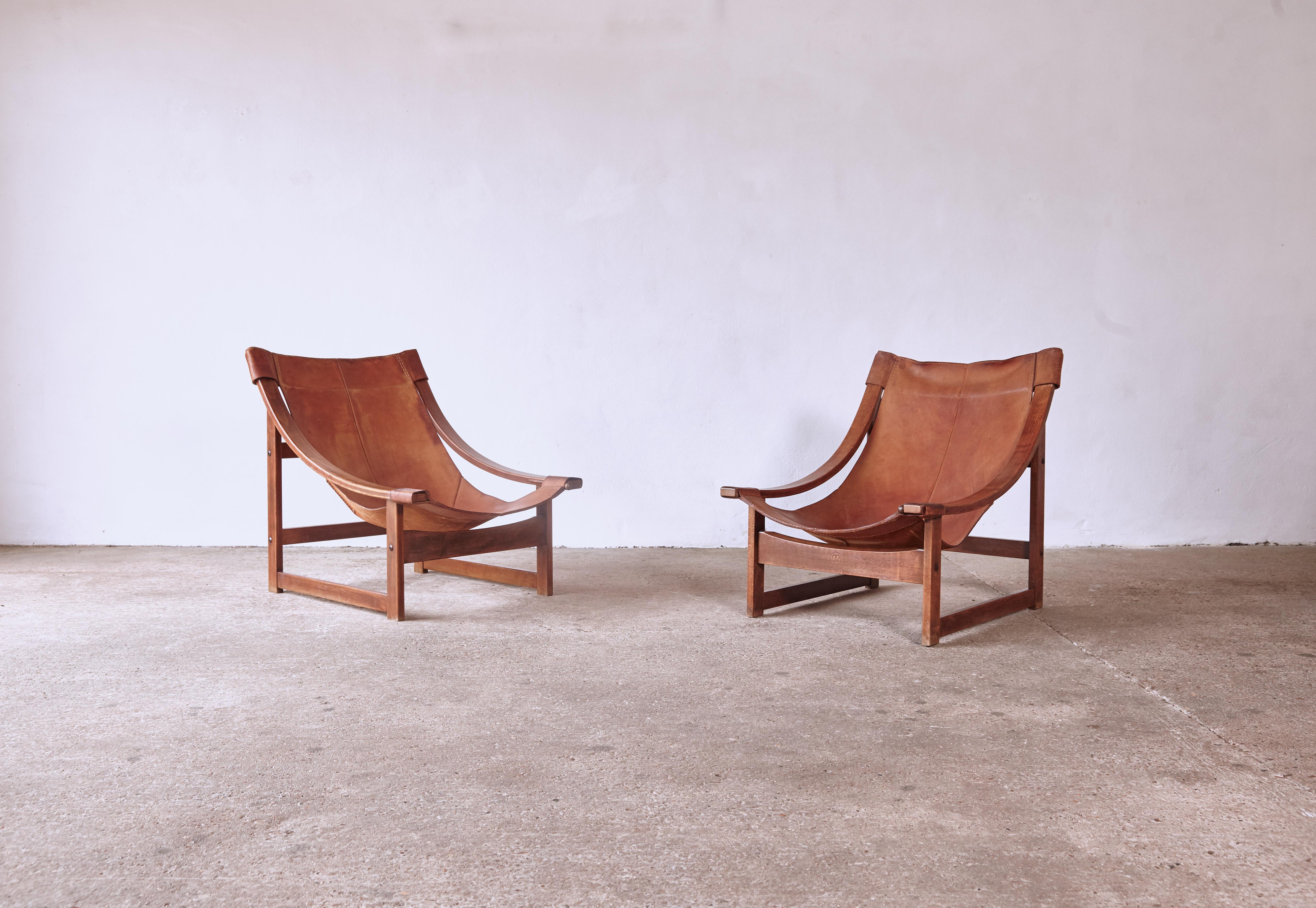 Superb and very rare Vicente Sánchez Pablos walnut and leather lounge chairs produced by Manufacturas Artesanas, Spain, 1960s. Original condition. Incredible patina. Ships worldwide.



UK customers please note displayed prices are exclusive of
