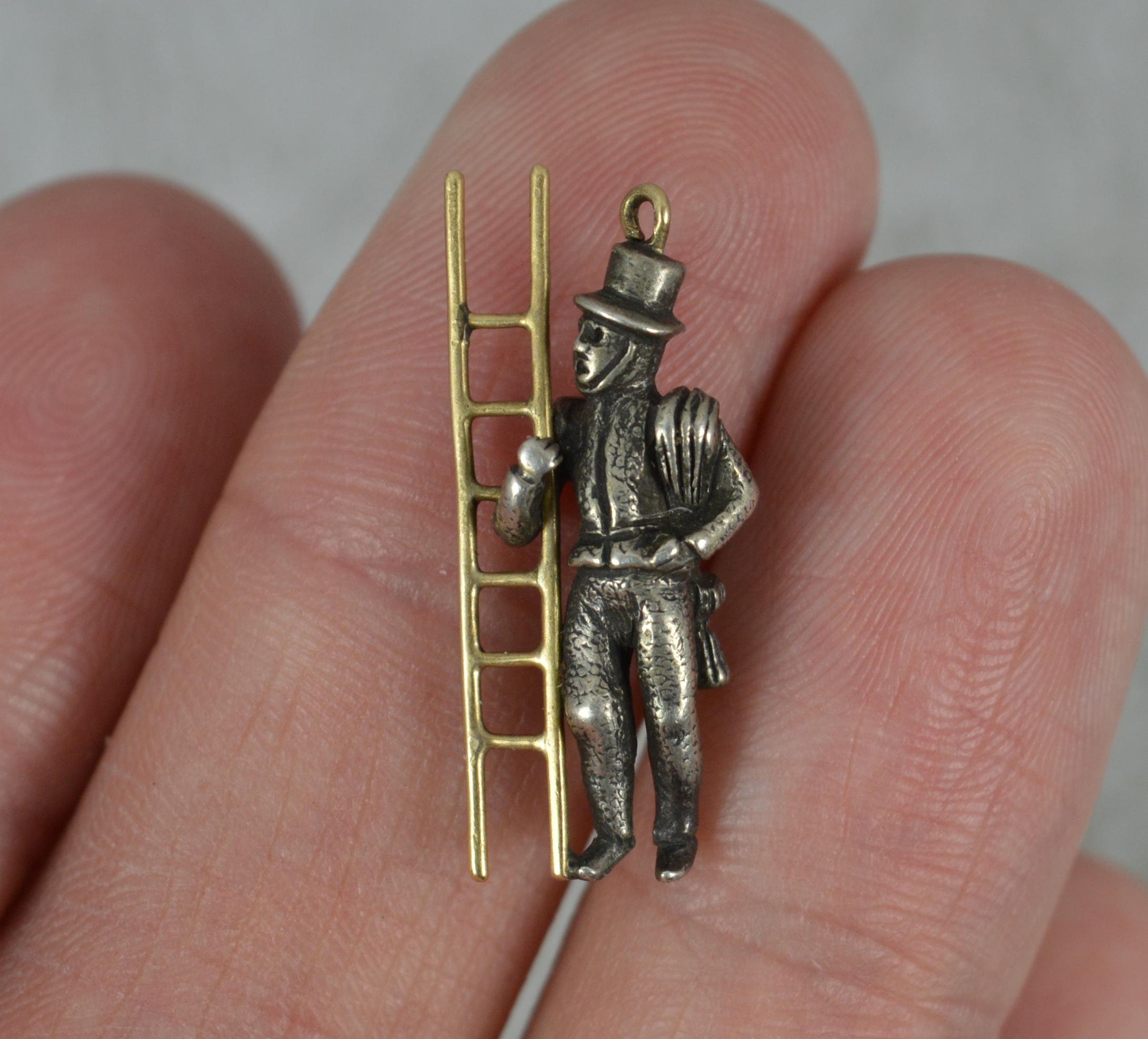 A highly unusual novelty charm pendant.
True Victorian example c1880.
Solid 9 carat rose gold and silver example.
Well formed example with a gold ladder and male to side.

CONDITION ; Very good for age. Crisp design. Issue free. Please view