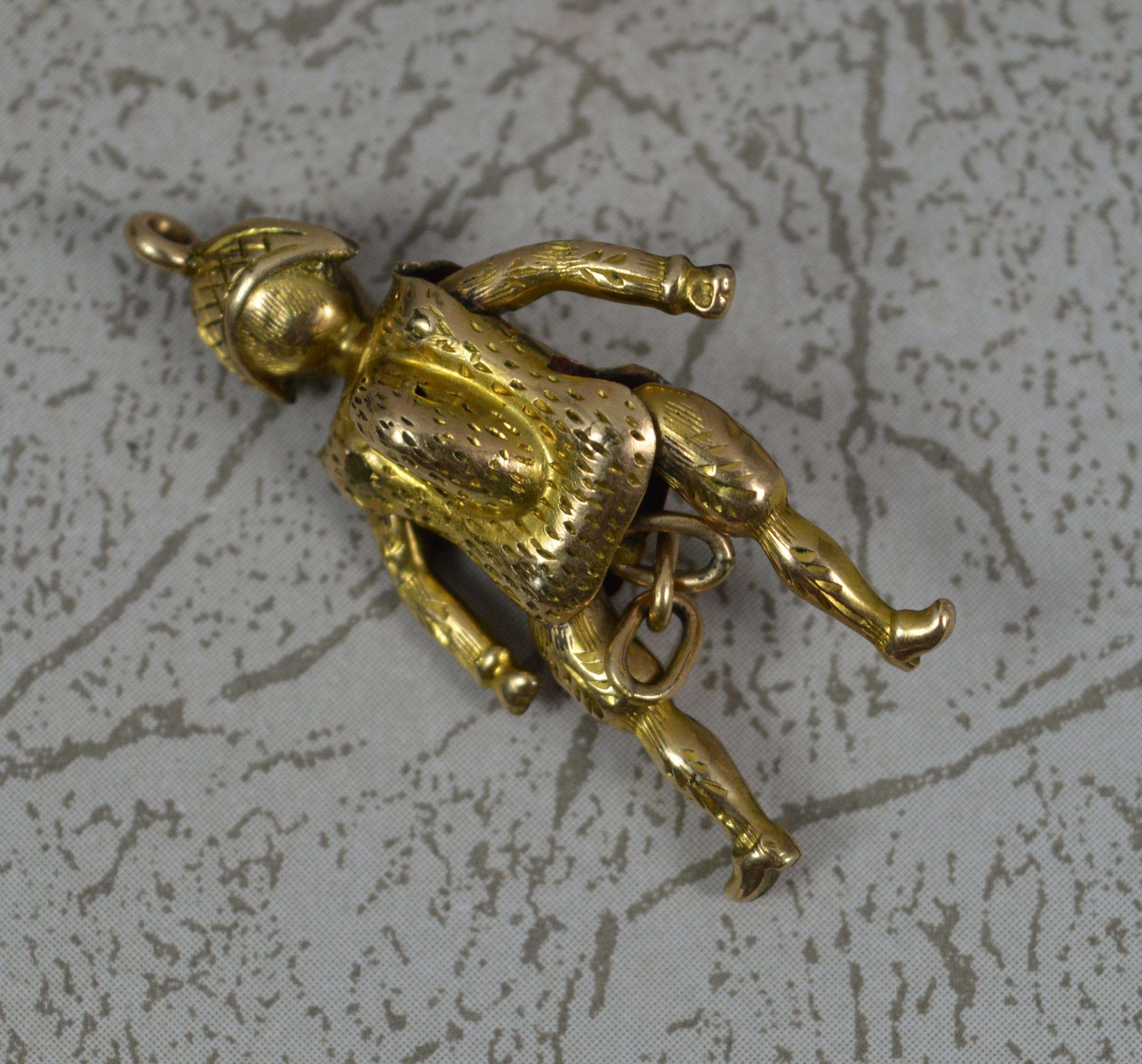 A highly unusual novelty charm pendant.
True Victorian example c1880.
Solid 9 carat rose gold example.
Well formed example as a jester or harlequin.
Articulated design whereby the links between the legs can be pulled down and the arms and legs open