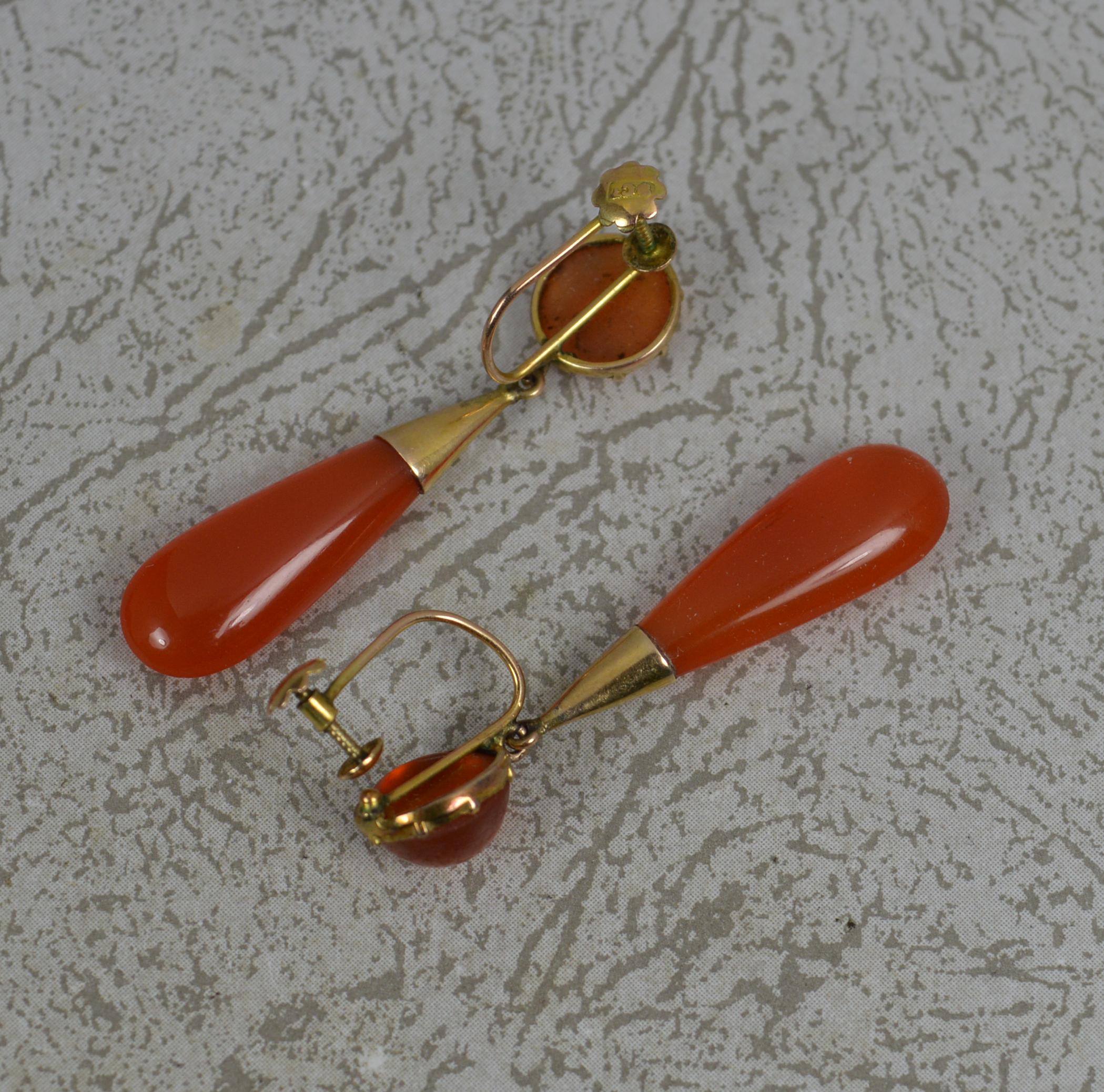 A stunning true antique earrings. Circa 1860.
A drop dangle example. Formed with a 9ct rose gold none pierced screw backs.
Designed with a round carnelian to top and torpedo carnelian below.

CONDITION ; Very good for age. Clean, well set stones.