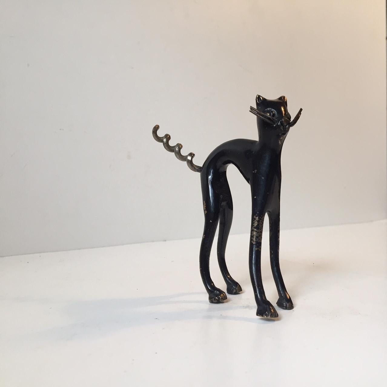 A Victorian Novelty item. A corkscrew in shape of a black cat. The cat is composed of black painted bronze and the 'screw' itself of steel. Perhaps Hertha Baller, Hagenauer and Walter Bosse was inspired by these old Victorian novelty item in their