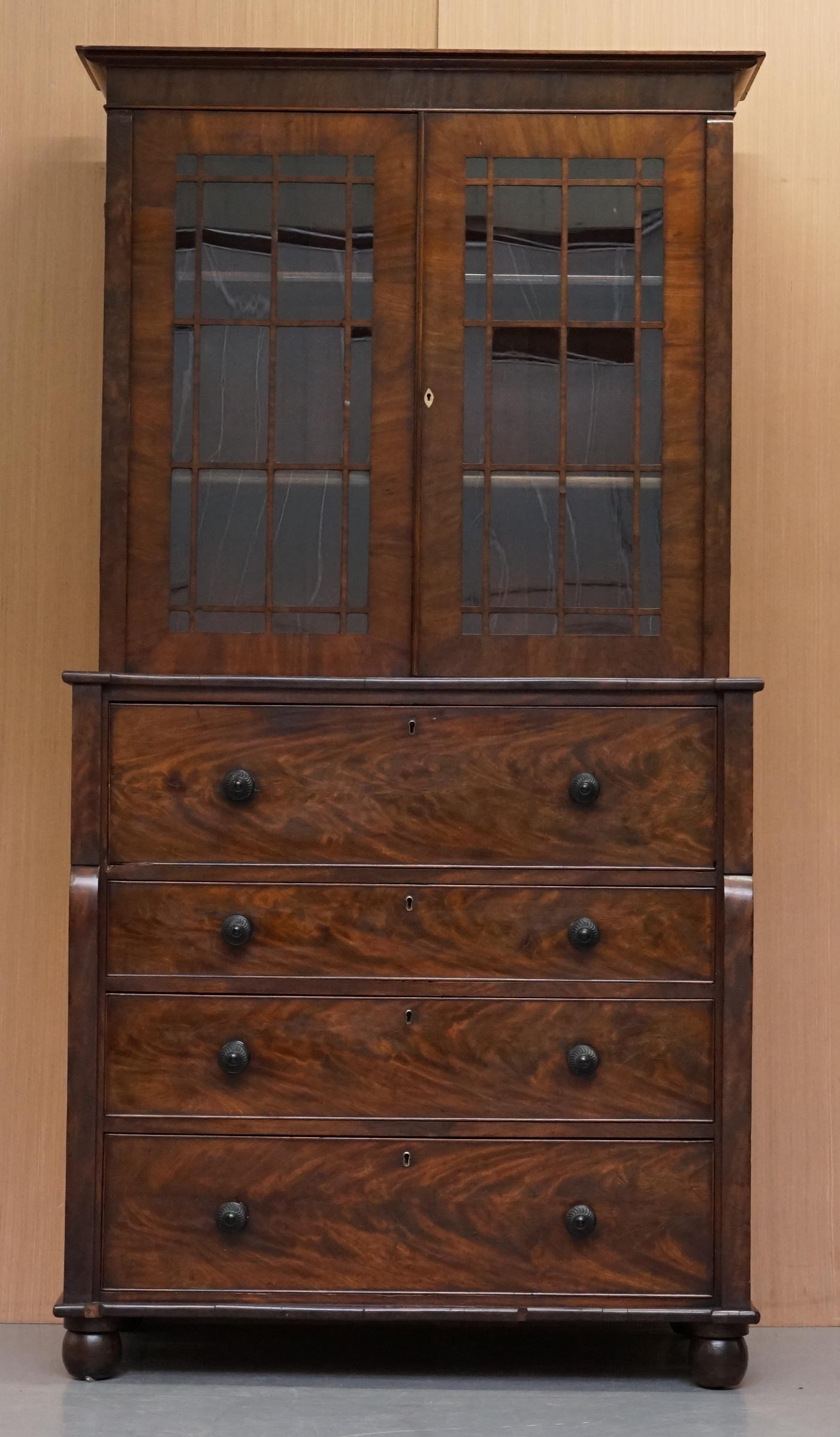 We are delighted to offer for sale this lovely Victorian flamed mahogany library bookcase with built in secrataire desk and chest of drawers

A good looking and multifunctional piece of furniture, to the top you have a medium sized bookcase, to