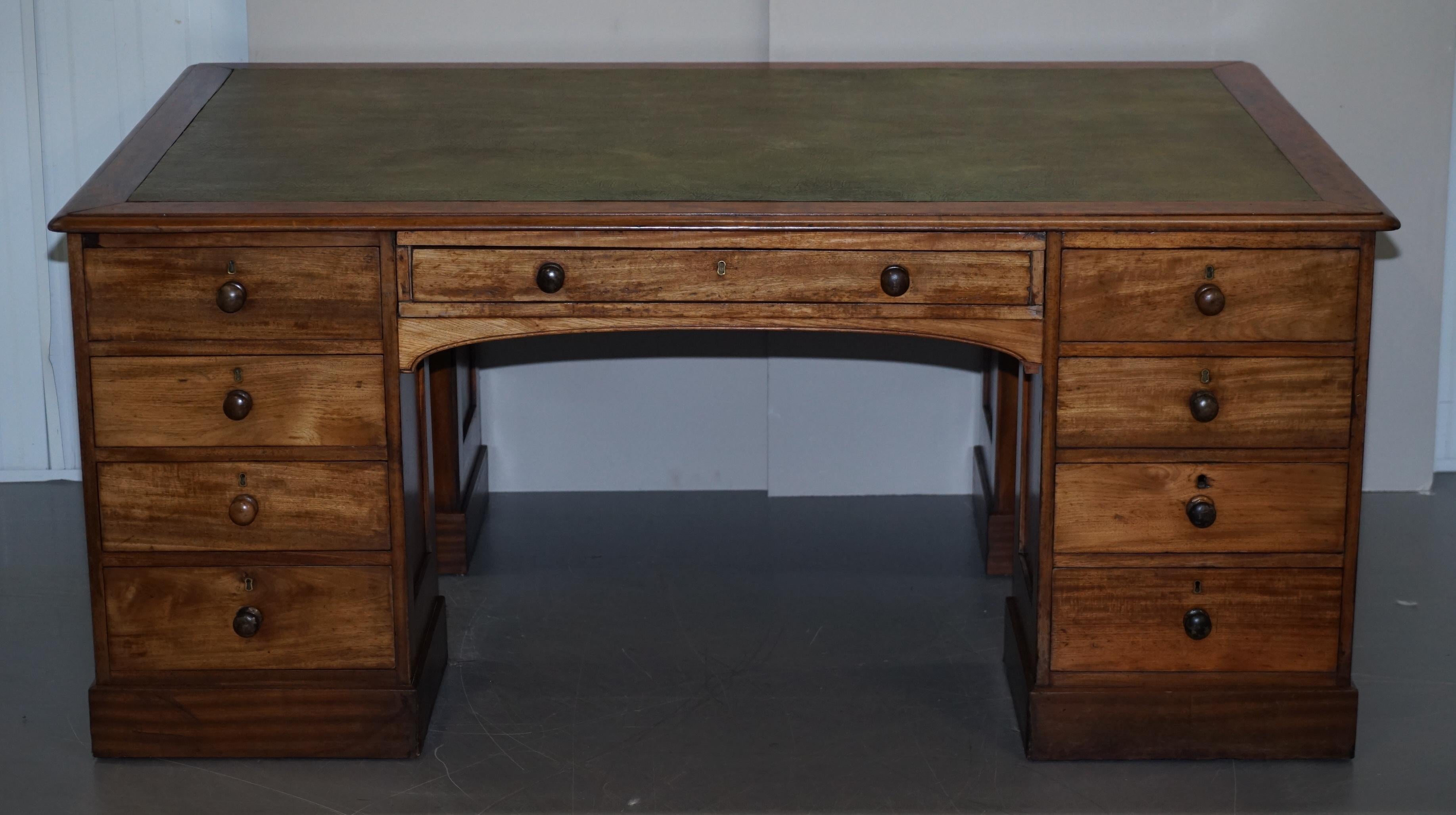 We are delighted to this very rare flamed mahogany quad four sided pedestal partners desk with green leather top

This is a very rare and collectable desk, designed for four people to use at the same time, having quad pedestals you can use four