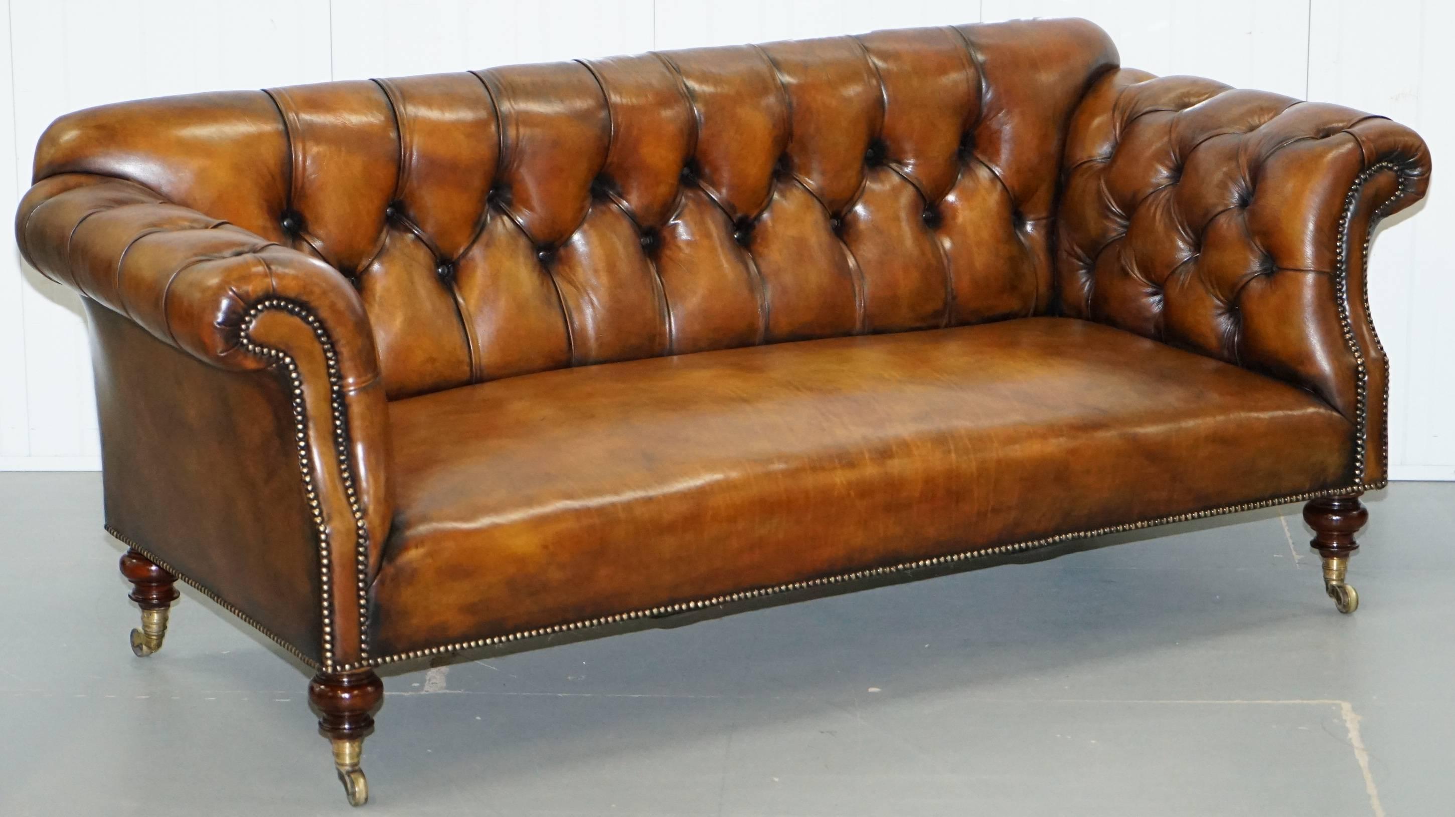 We are delighted to offer for sale this stunning exceptionally rare original early Victorian Howard & Son’s Berners street tobacco brown leather fully restored Chesterfield buttoned sofa

I have a Howard and Son's armchair listed under my other