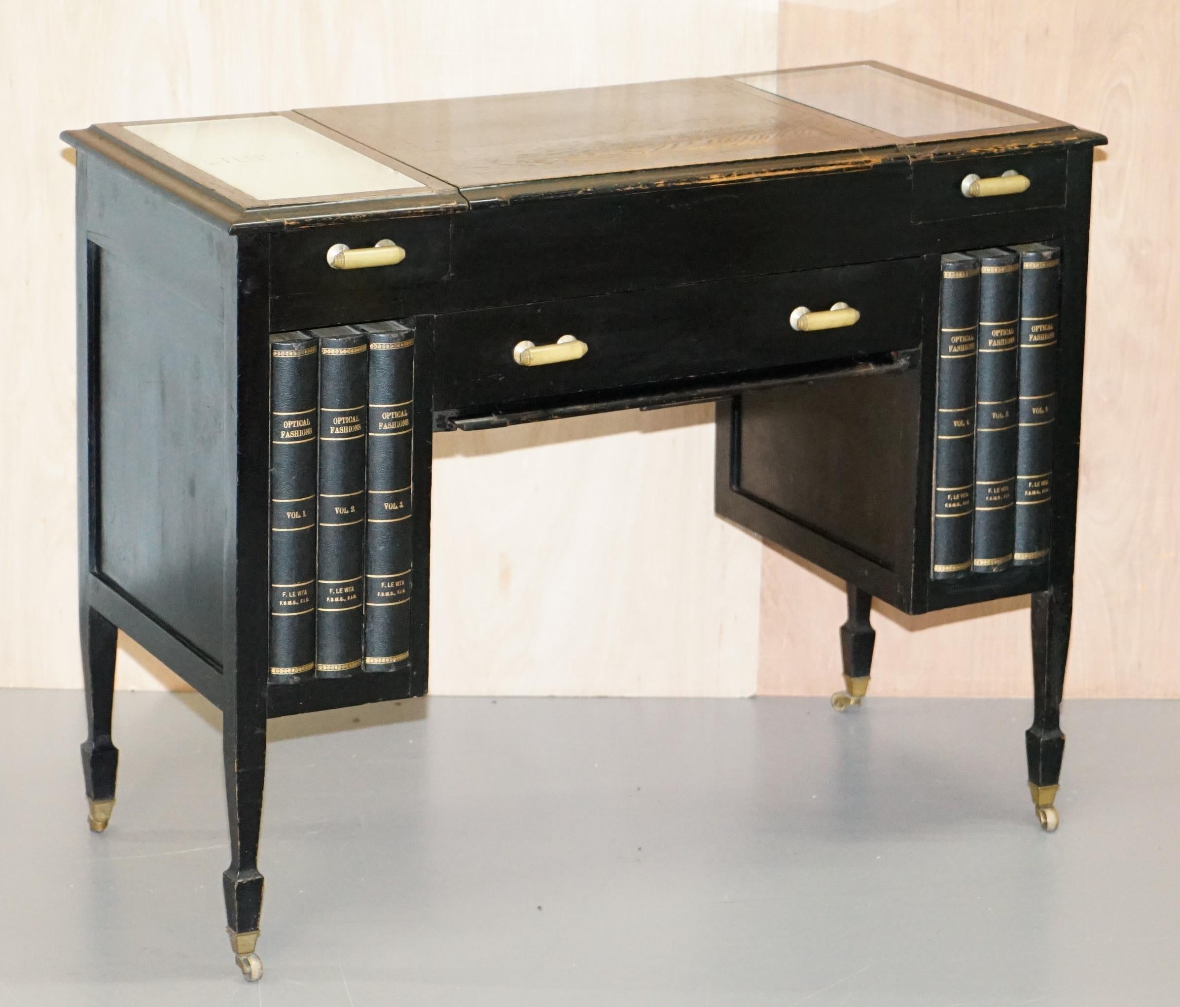 We are delighted to offer for sale this very rare and really quite stunning Lever Brothers London Victorian Ebonised opticians desk

A very good looking piece of furniture, its has lots of unique little touches, a sliding work shelf, a drawer with