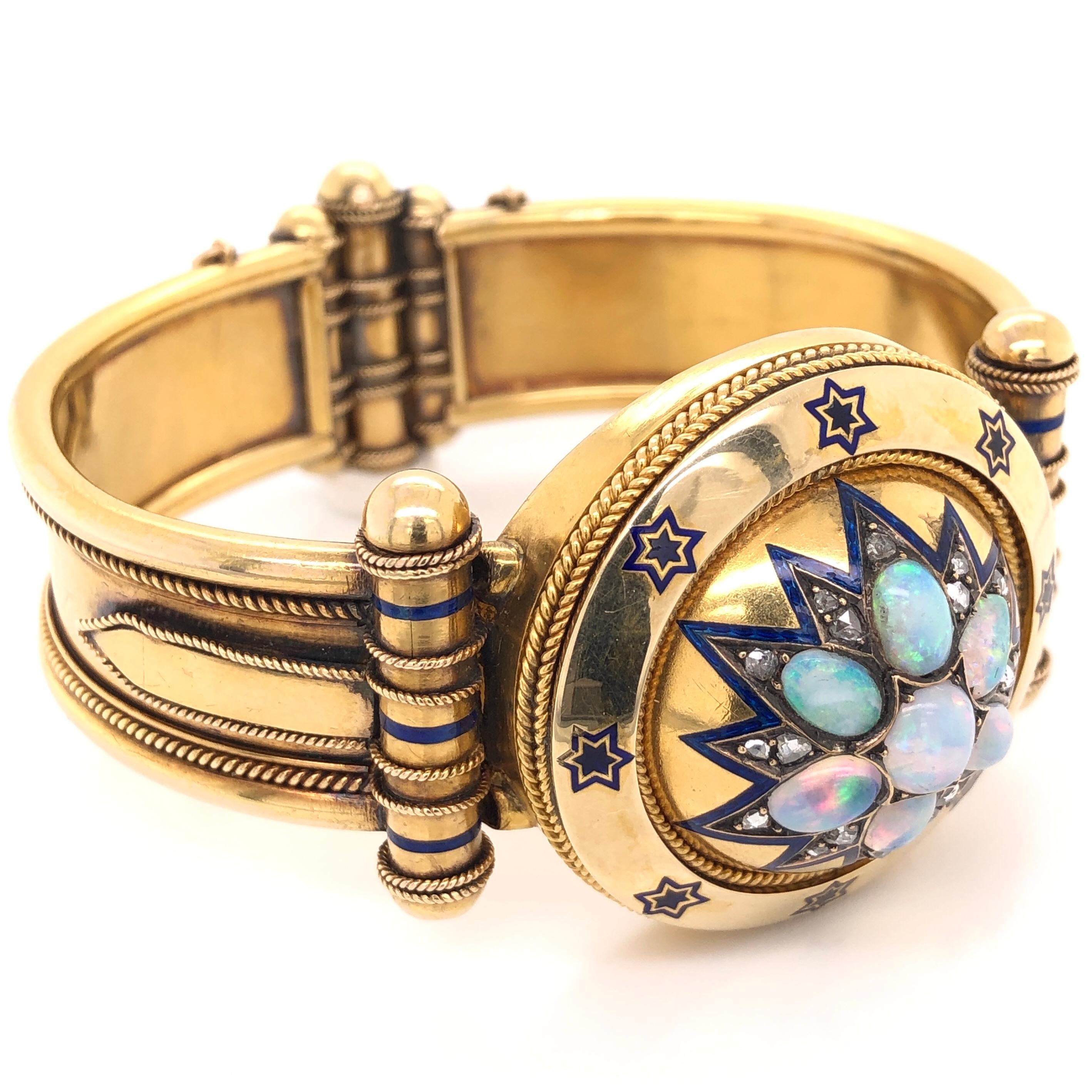 Simply Beautiful! Elegant and finely detailed Victorian Antique Opal, Diamond and Enamel Bangle Cuff Bracelet. Hand crafted in 18 Karat yellow Gold and set with opals, weighing approx. 2.20 total Carat weight and Diamonds, approx. 0.70 total Carat