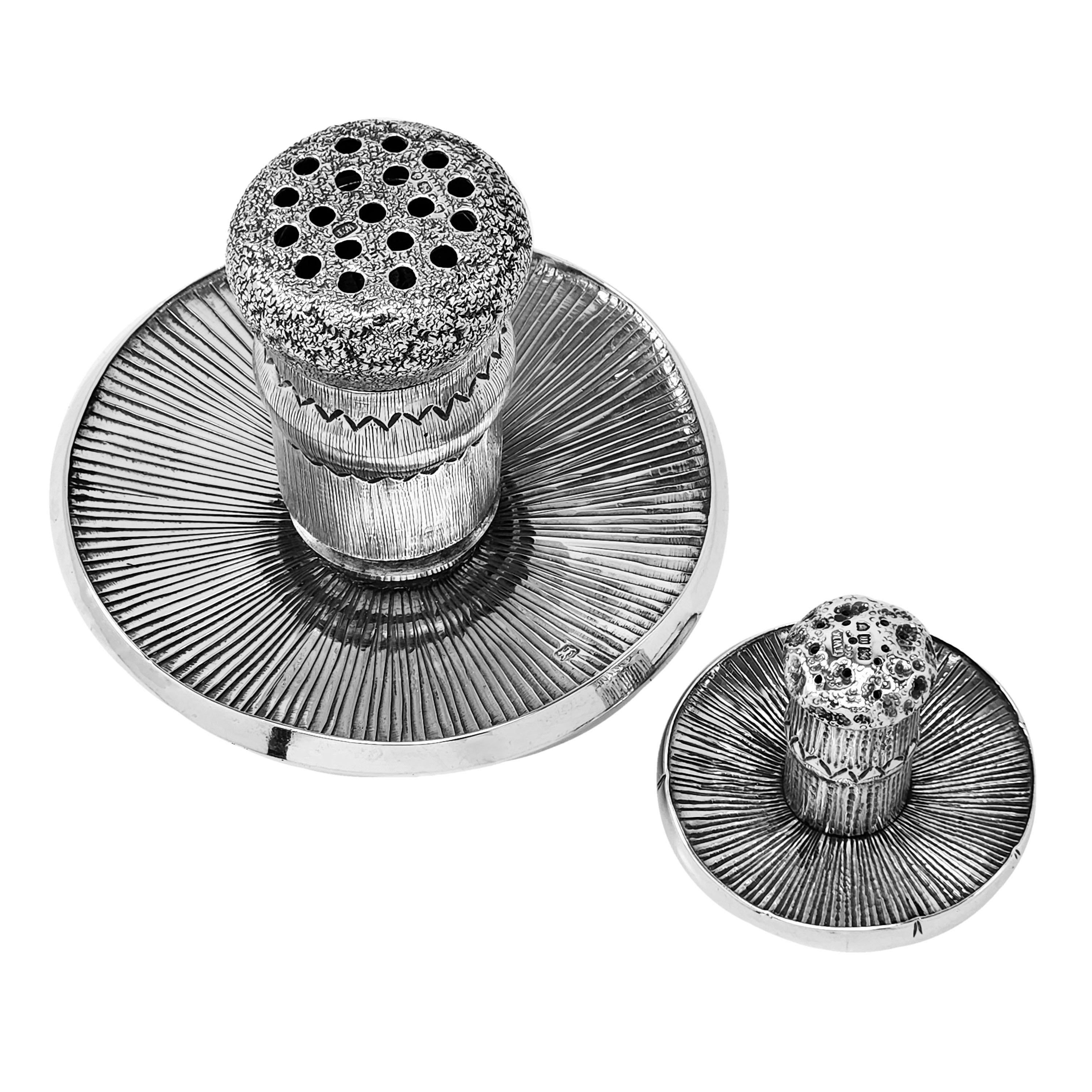 A fantastic Victorian Sterling Silver Novelty Pepper Grinder in the shape of a Mushroom with a matched Edwardian Silver Salt Shaker. The Pepper Grinder and Salt Pot are both beautifully modelled. The Pepper Grinder is in working order.

Pepper