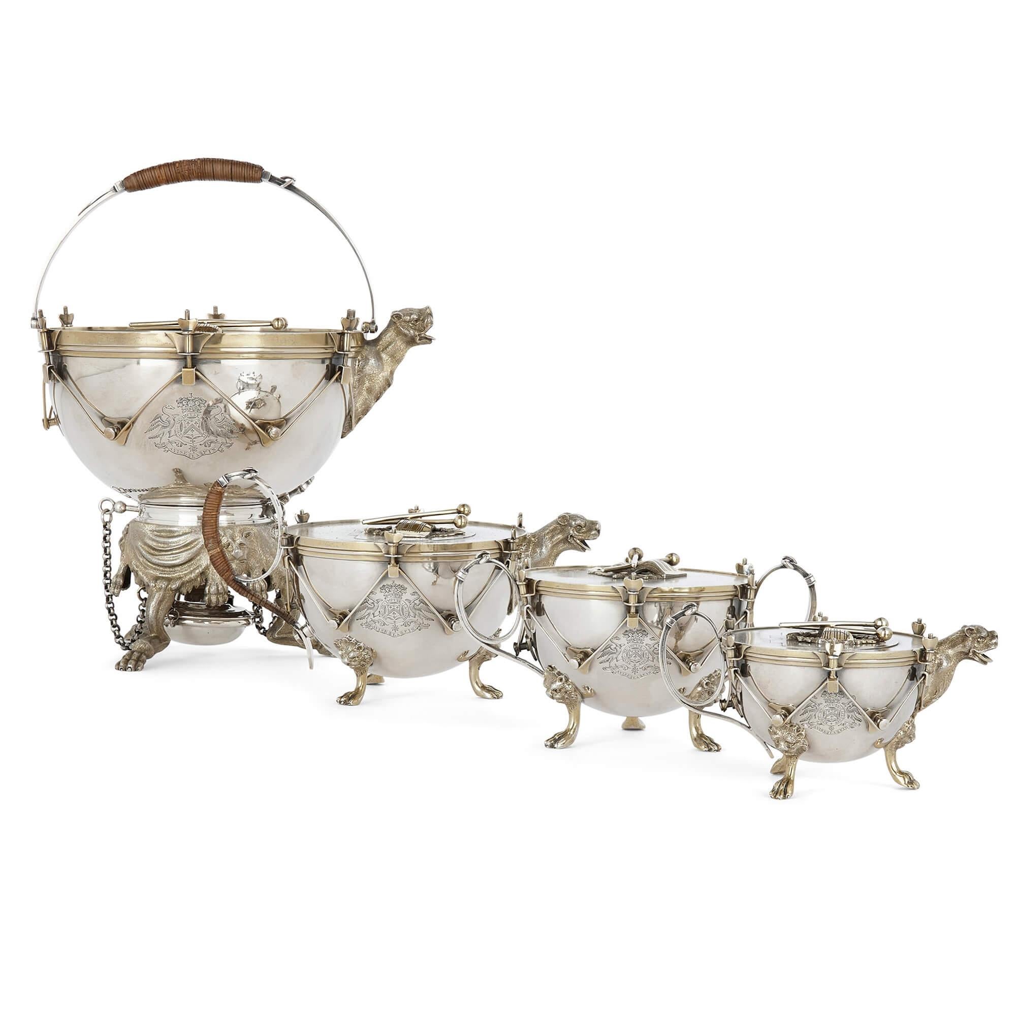 Rare Victorian silver tea and coffee set by Edward C. Brown
English, 1867 
Milk jug: Height 7.5cm, width 14cm, depth 10cm
Teapot on stand: Height 29cm, width 23cm, depth 20cm

Crafted by Edward Charles Brown, a distinguished Victorian silversmith,