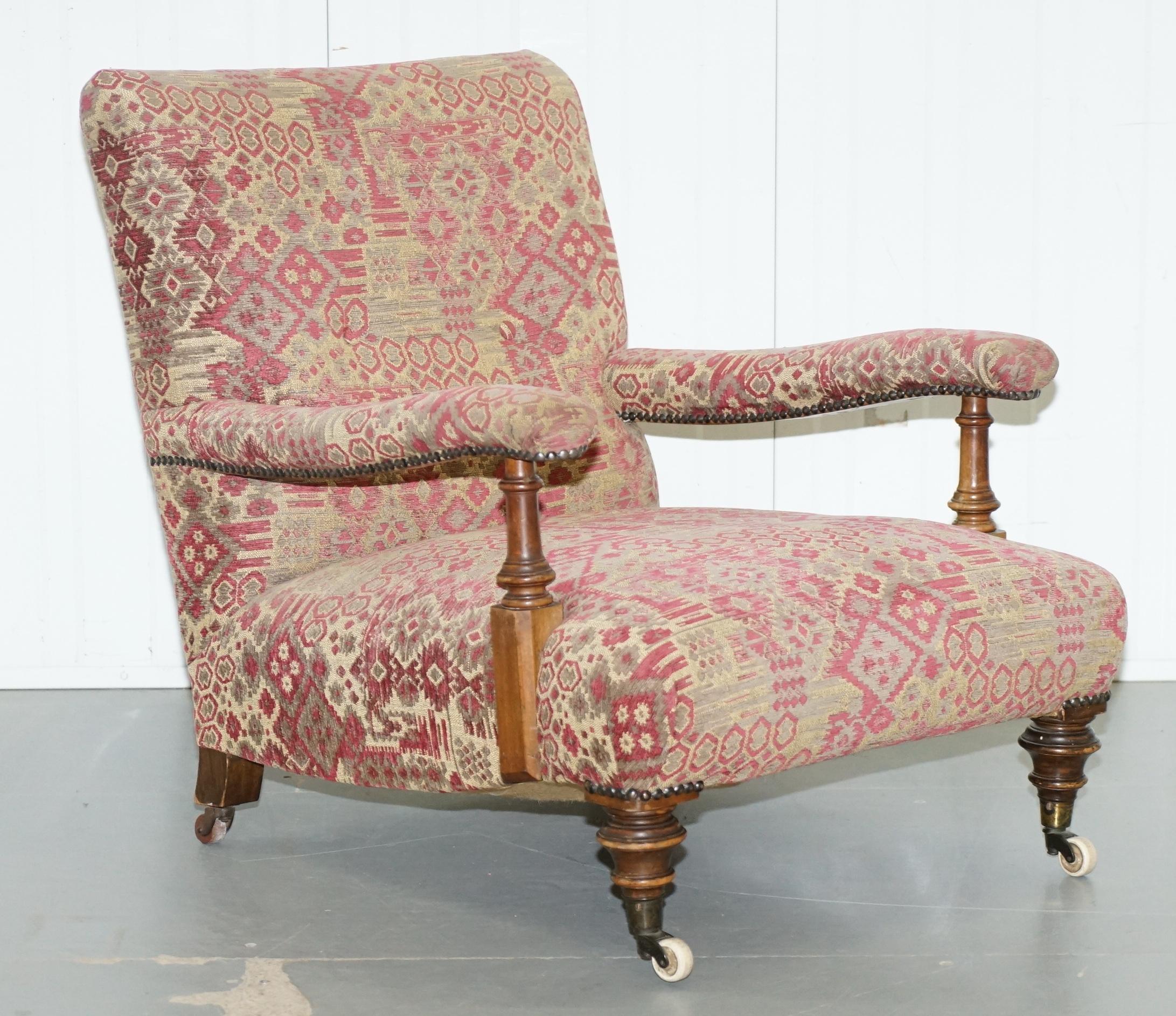 We are delighted to offer for sale this lovely original Victorian Walnut framed Kilim upholstered Howard Library reading armchair

A very good looking and well-made piece, very rare to find in original Kilim upholstery, this is a Howard model