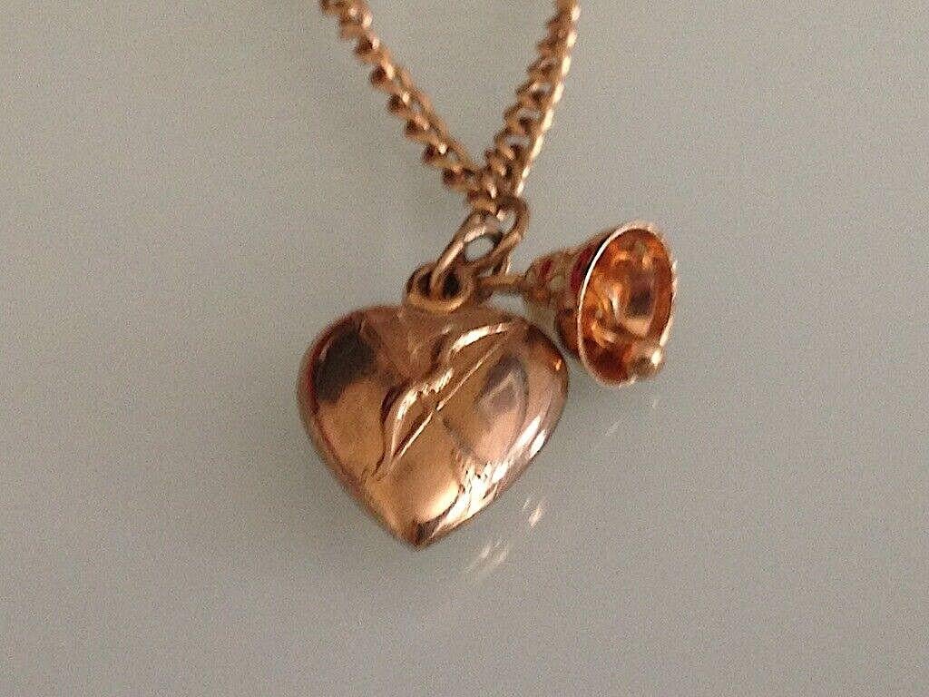 Beautiful Rare
Rose Gold Bracelet
Stamped 10k and fully hallmarked by London assay Hallmarkers 
depicts cupids arrow on heart (Hollow) and teamed with a tinkering bell .
