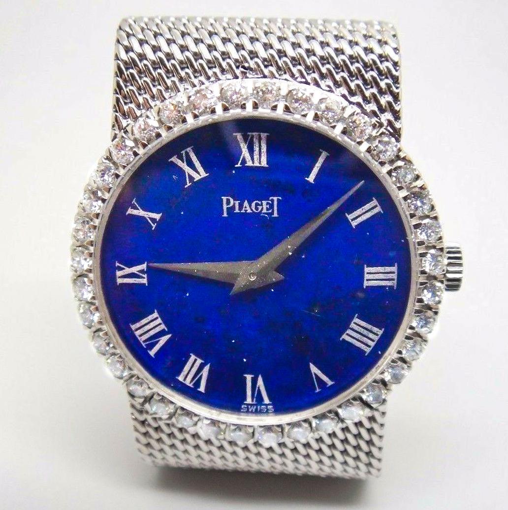 Case dimensions:
Diameter: 24mm
Bracelet Length : 185mm

The present large 1970s Diamond set Piaget example is an extremely desirable case design for the brand which is designed with a Vibrant Blue Lapis dial in perfect condition with an excellent