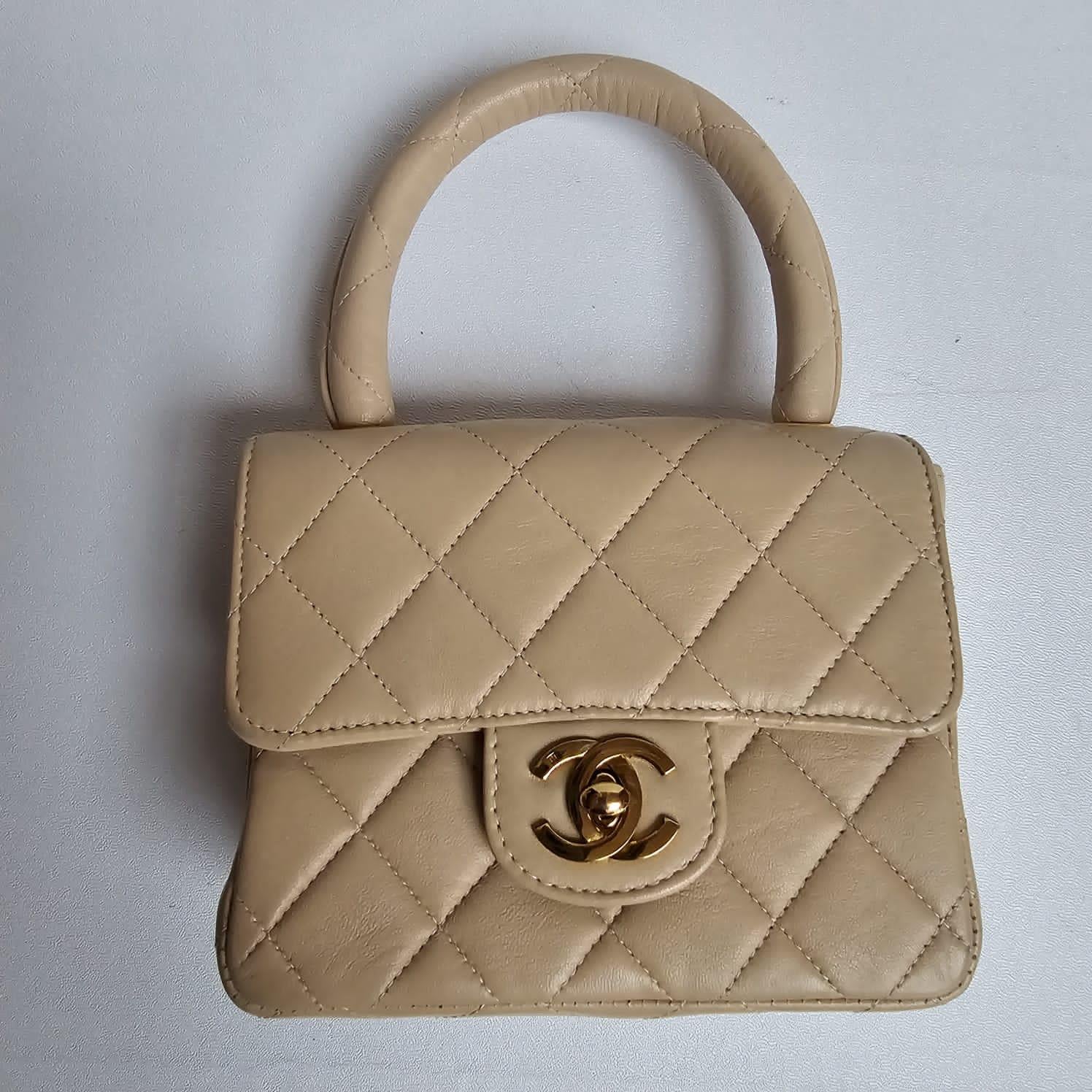 Rare sac double matelassé en cuir d'agneau beige des années 1990 en vente 1